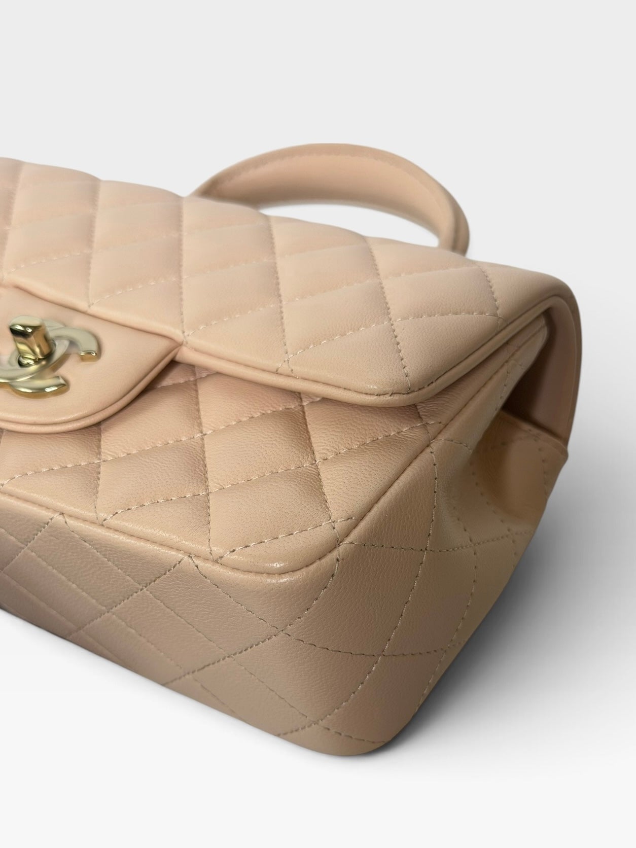 Chanel Mini Rectangle Top Handle Beige Lambskin Pale Gold Hardware. 100% authentic and preloved in excellent condition.