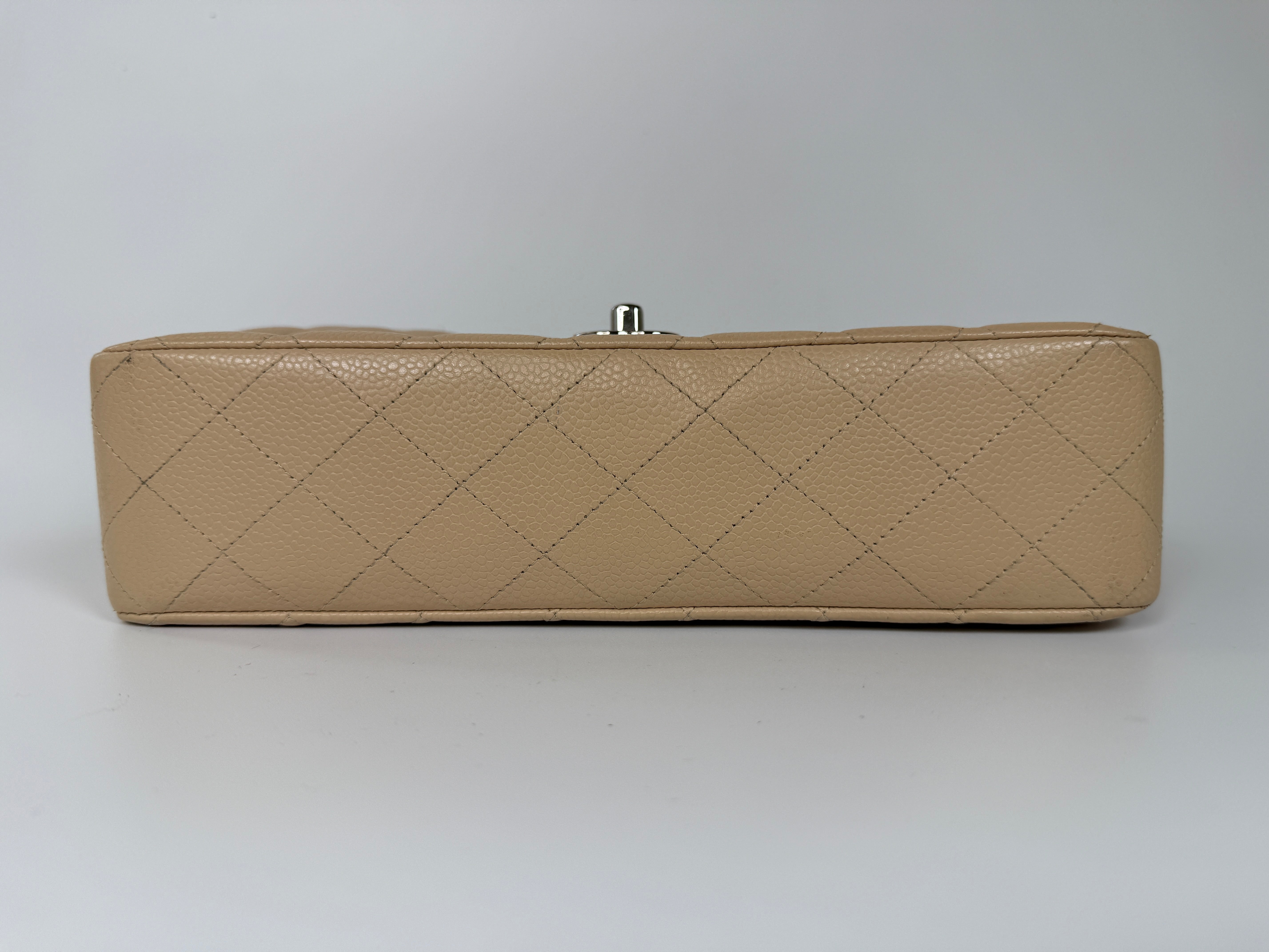 Chanel Medium Classic Double Flap Light Beige Caviar With Silver Hardware
Excellent condition, verified by Luxe Cheshire. International, fast  and fully insured delivery. Trusted designer resale.