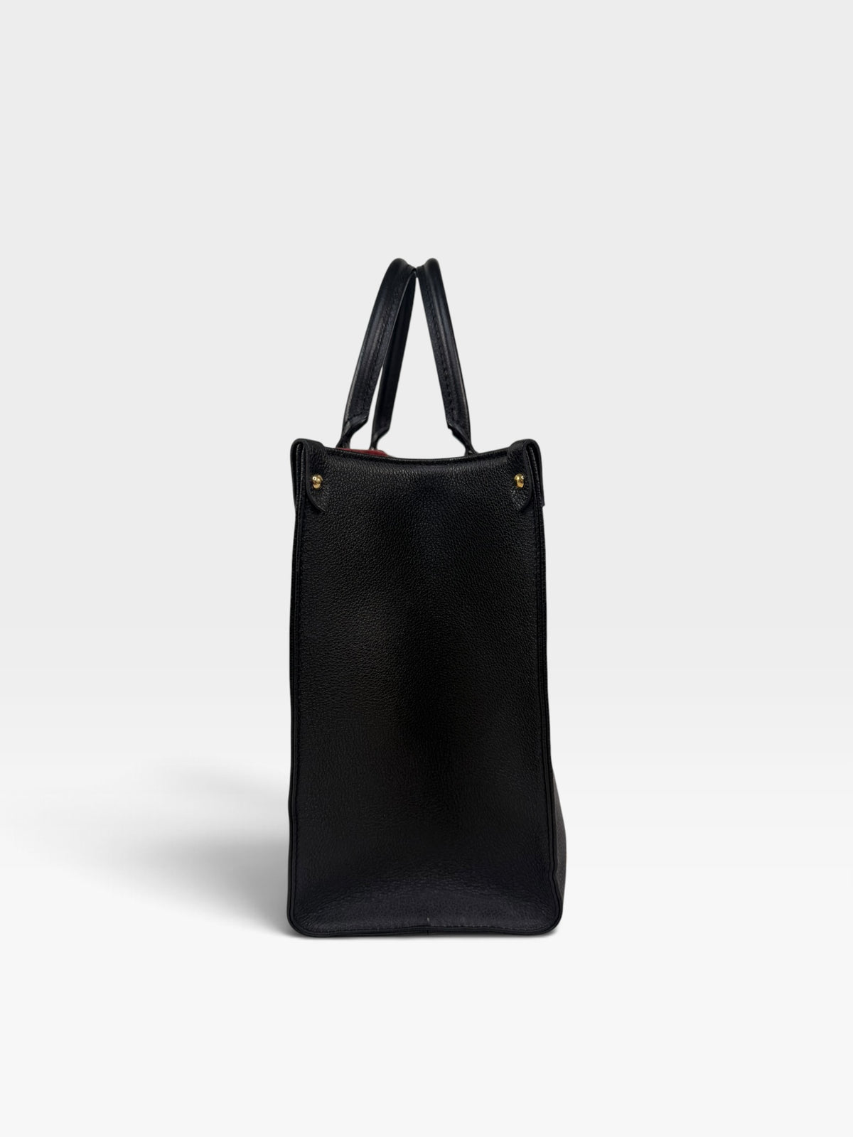 Louis Vuitton On The Go MM Tote In Black & Beige Leather With Gold Hardware. 100% authentic and preloved in excellent condition