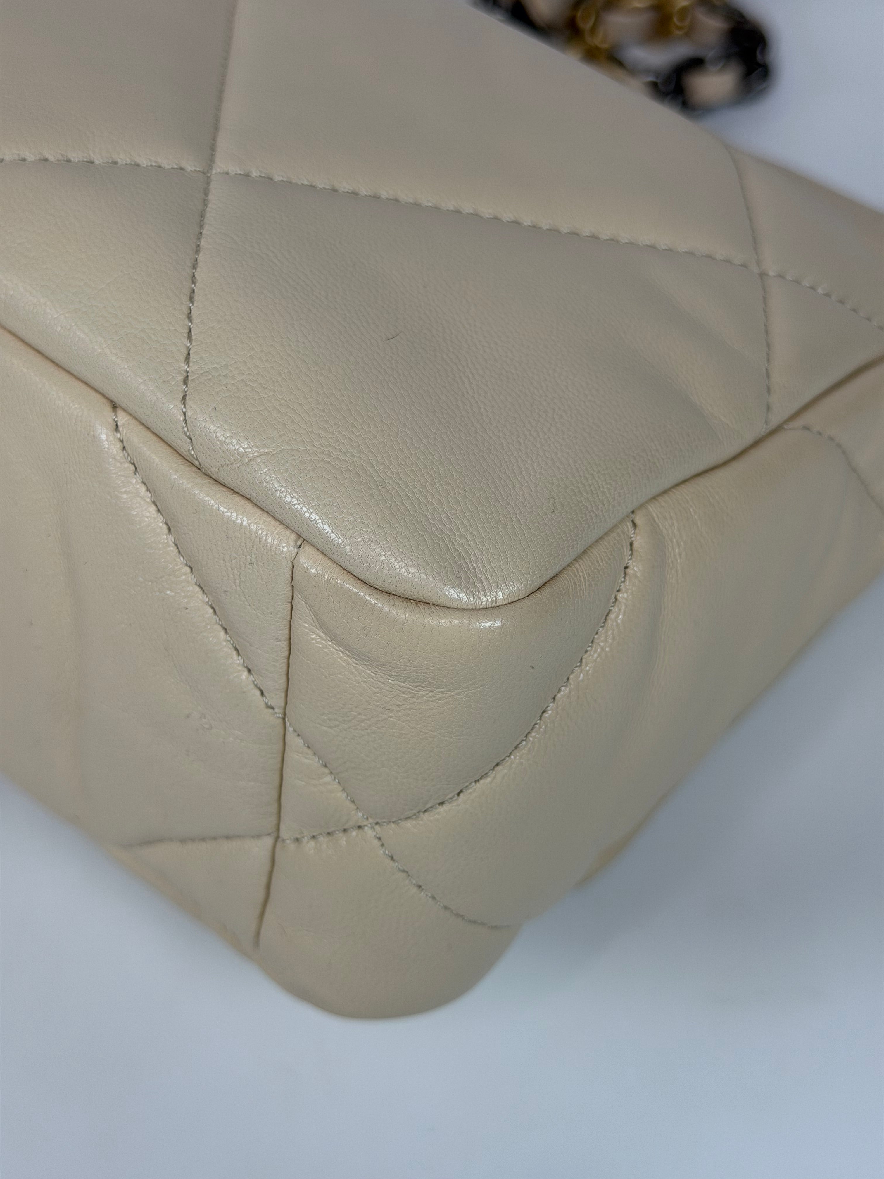 Chanel 19 Small In Beige Leather With Mixed Hardware. Authentic and preloved in excellent condition. Verified by Luxe Cheshire.