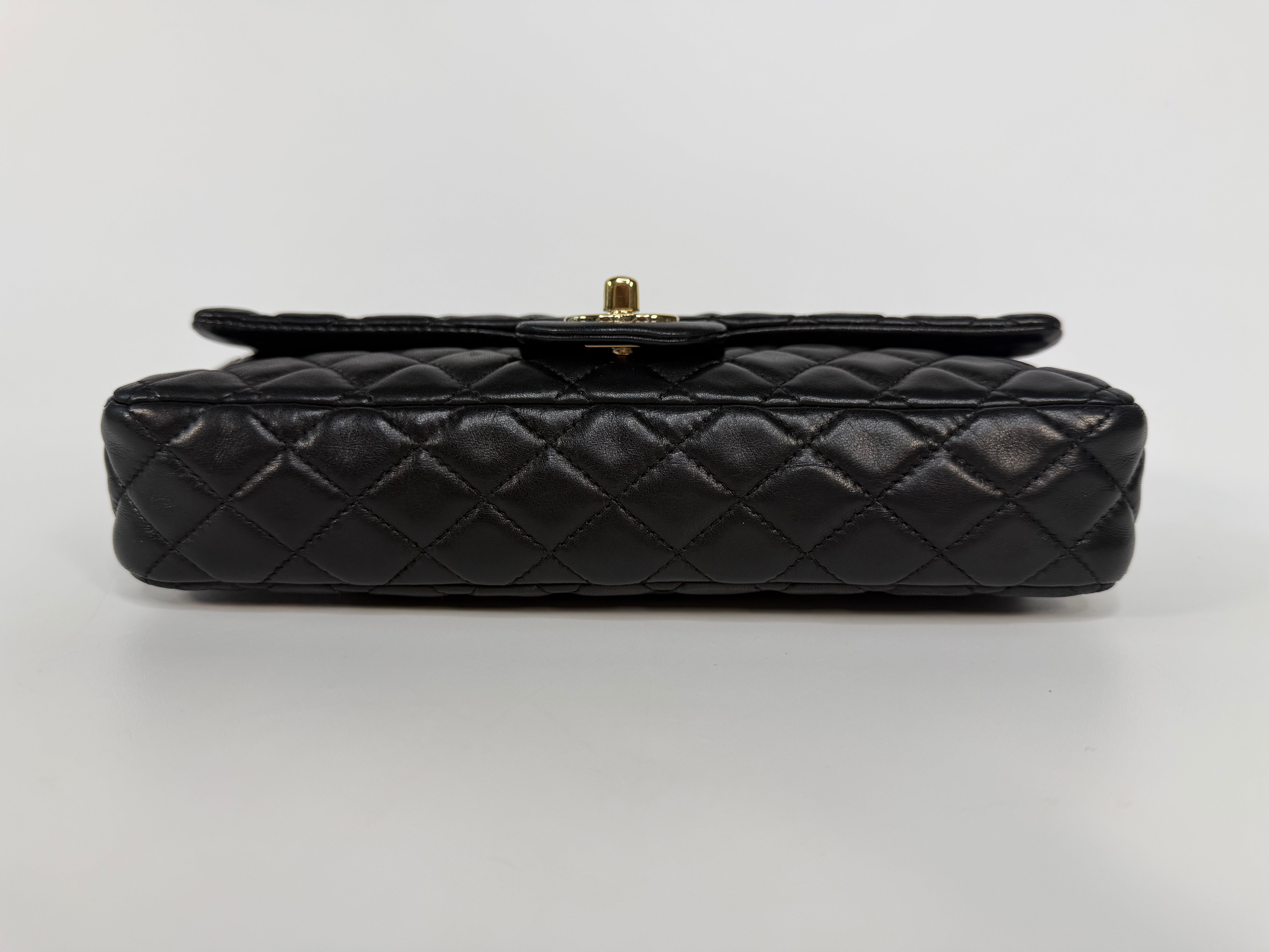 Chanel East West Charms Bag In Black Lambskin Leather With Gold Hardware