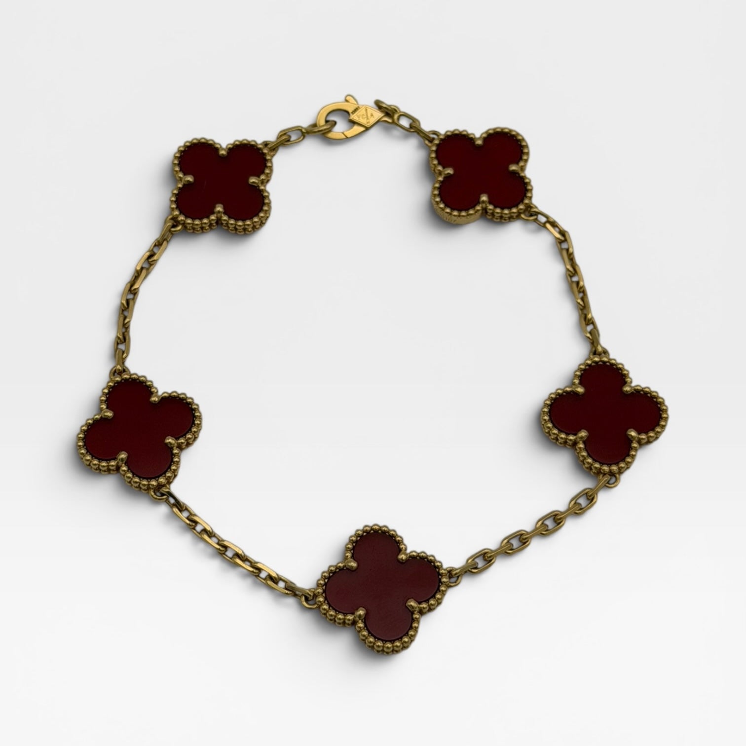 Van Cleef & Arpels Vintage Alhambra 5 Motif Bracelet In Carnelian. 100% authenticate and preloved in excellent condition.