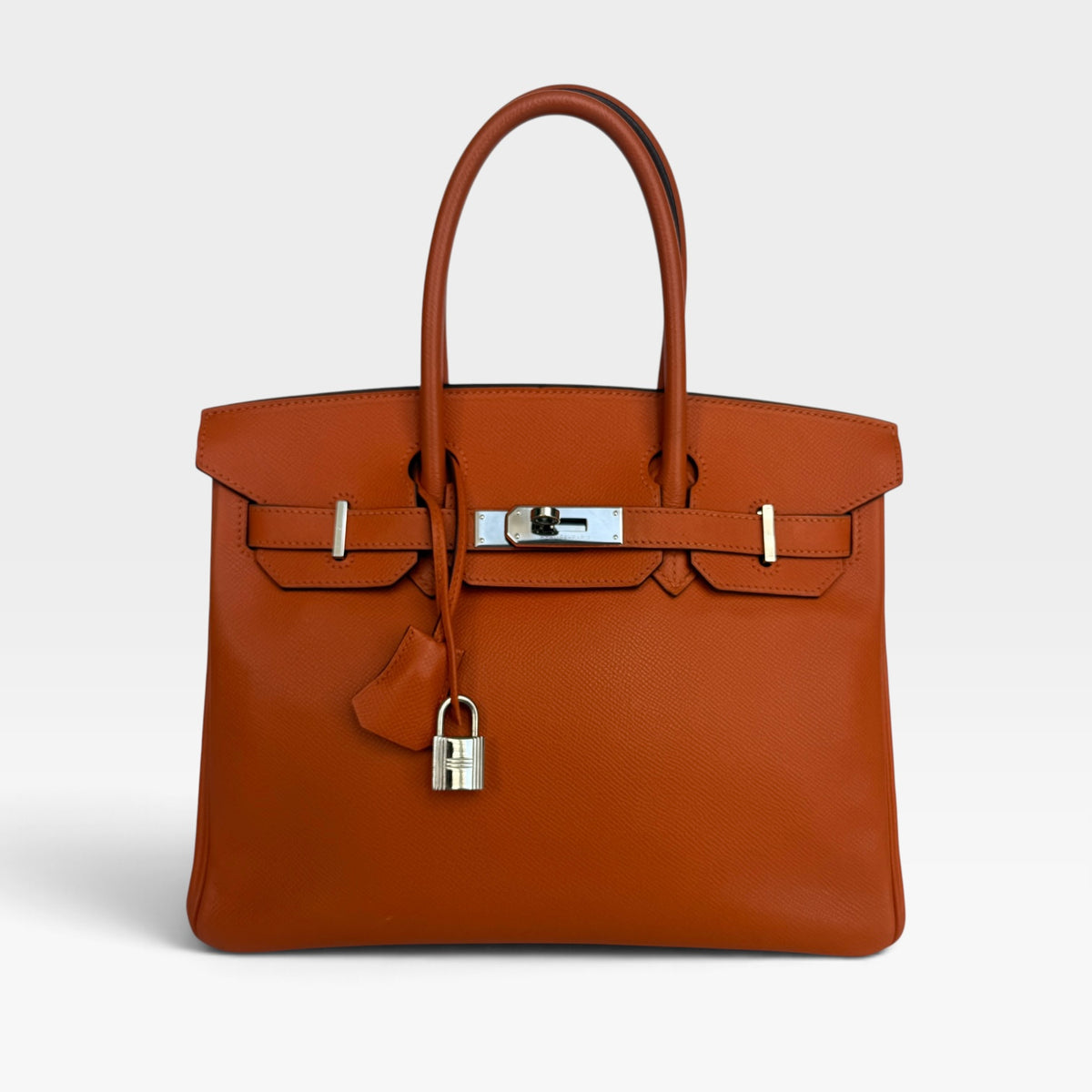 Hermès Birkin 30 In Orange Epsom Leather With Palladium Hardware. 100% authentic and preloved in excellent condition.