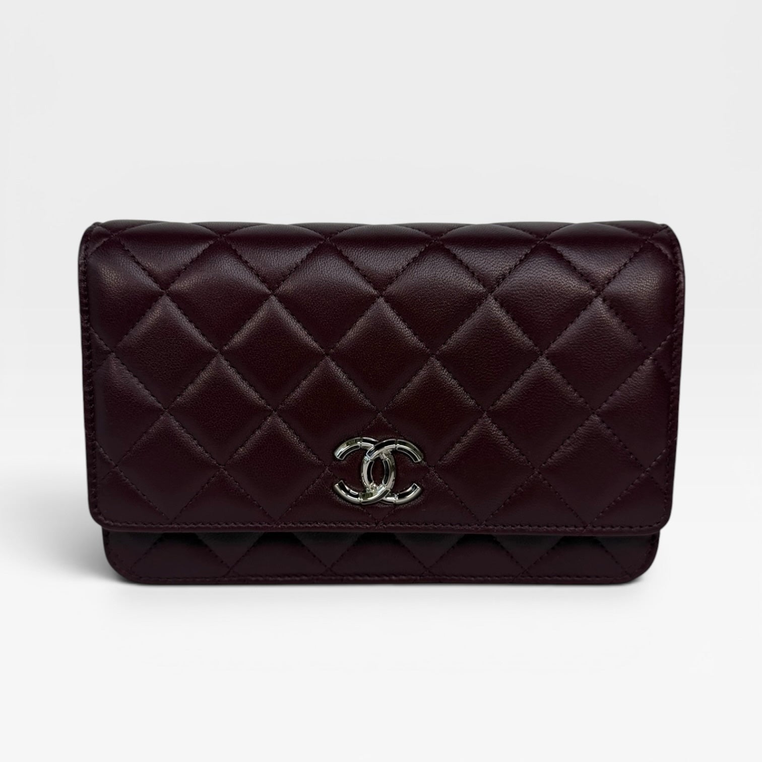 Chanel Wallet On Chain In Burgundy Lambskin With Silver Hardware. Authentic and preloved in excellent condition. 100% Guarantee