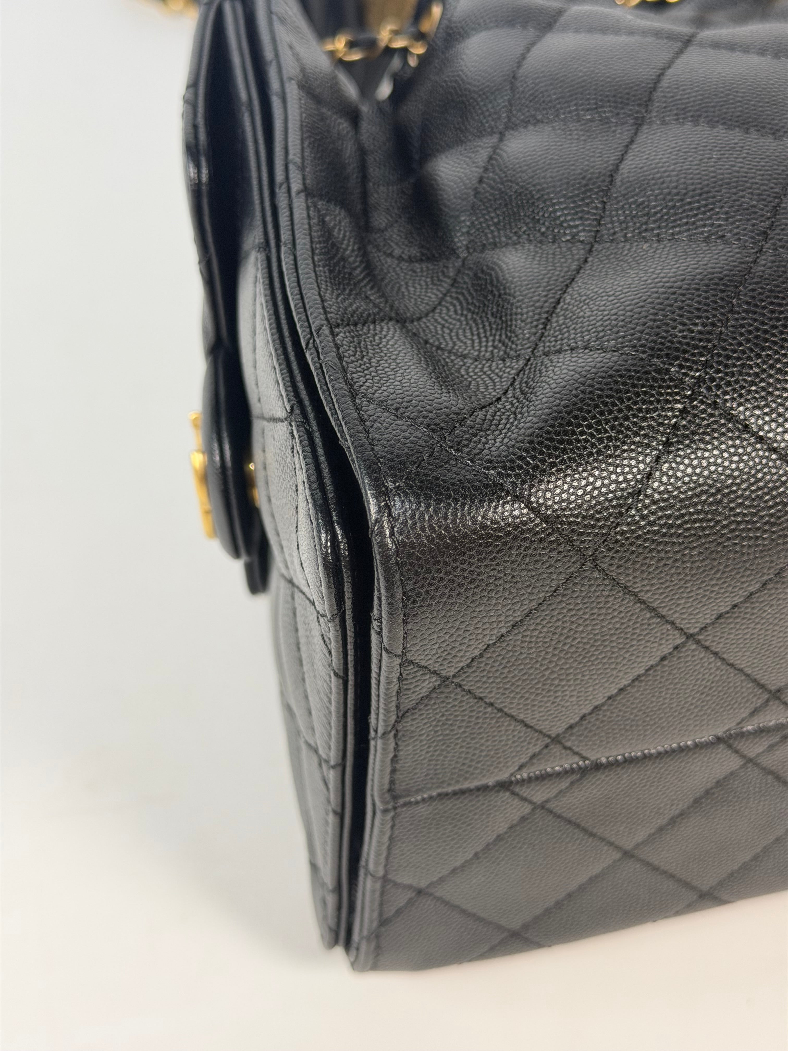 Chanel 25 Small In Black Caviar Leather With Gold Hardware in excellent condition 100% authentic and preloved