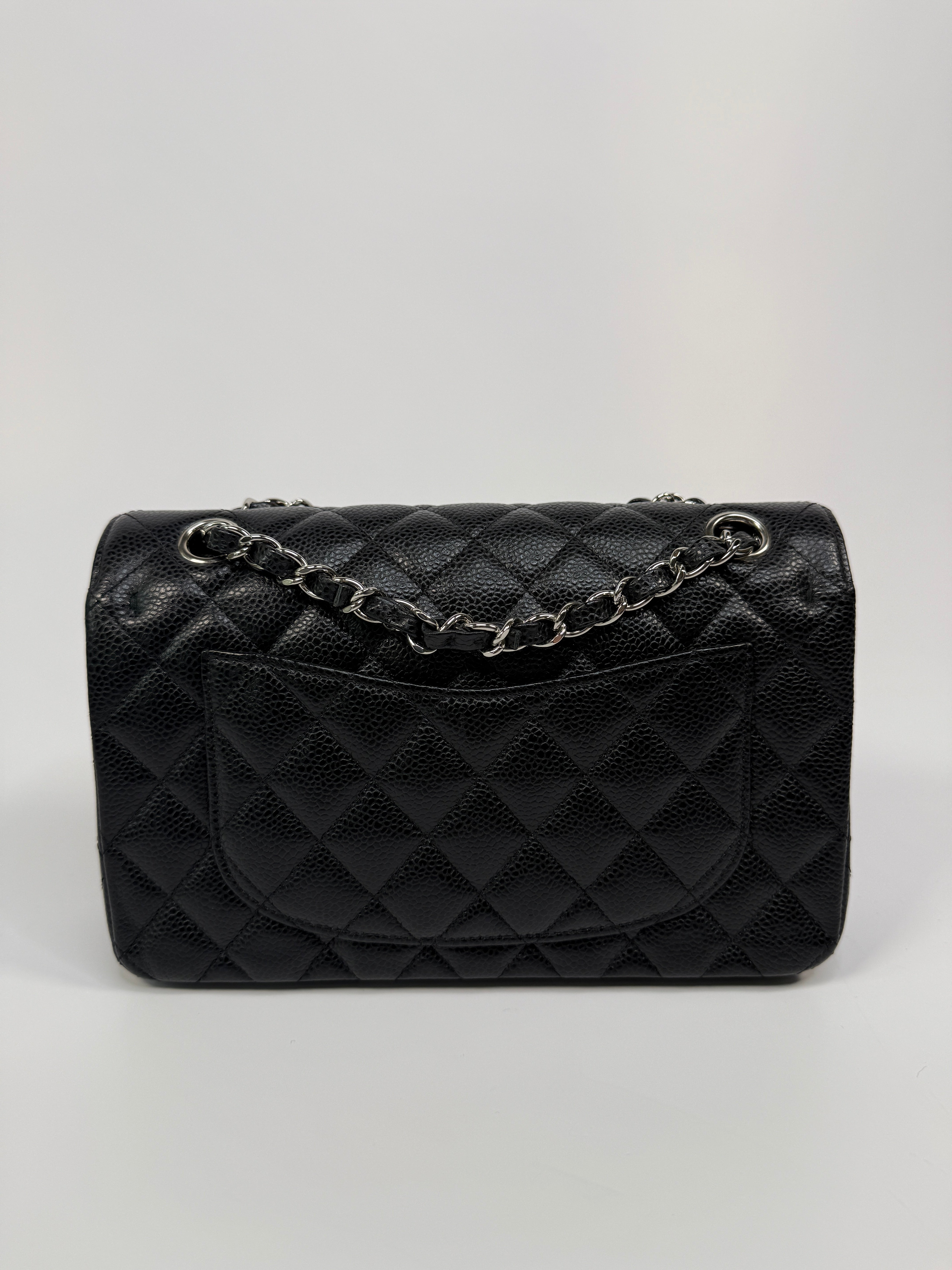 Chanel Small Classic Double Flap In Black Caviar Leather With Silver Hardware
Pre Loved & Authentic 