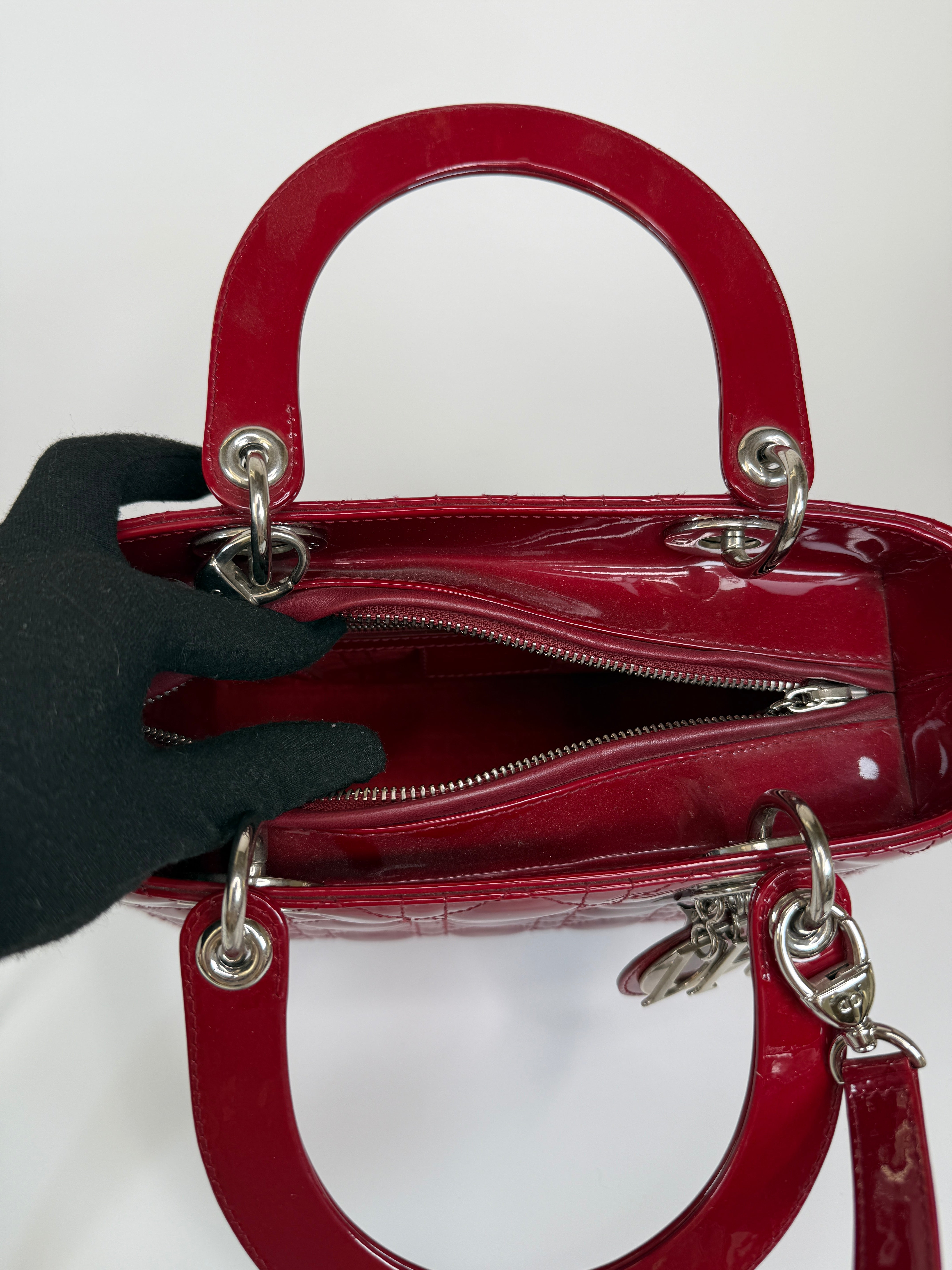 Christian Dior Medium Lady Dior In Patent Red Leather With Silver Hardware Authentic and preloved. 100% Authenticity Guarantee 
