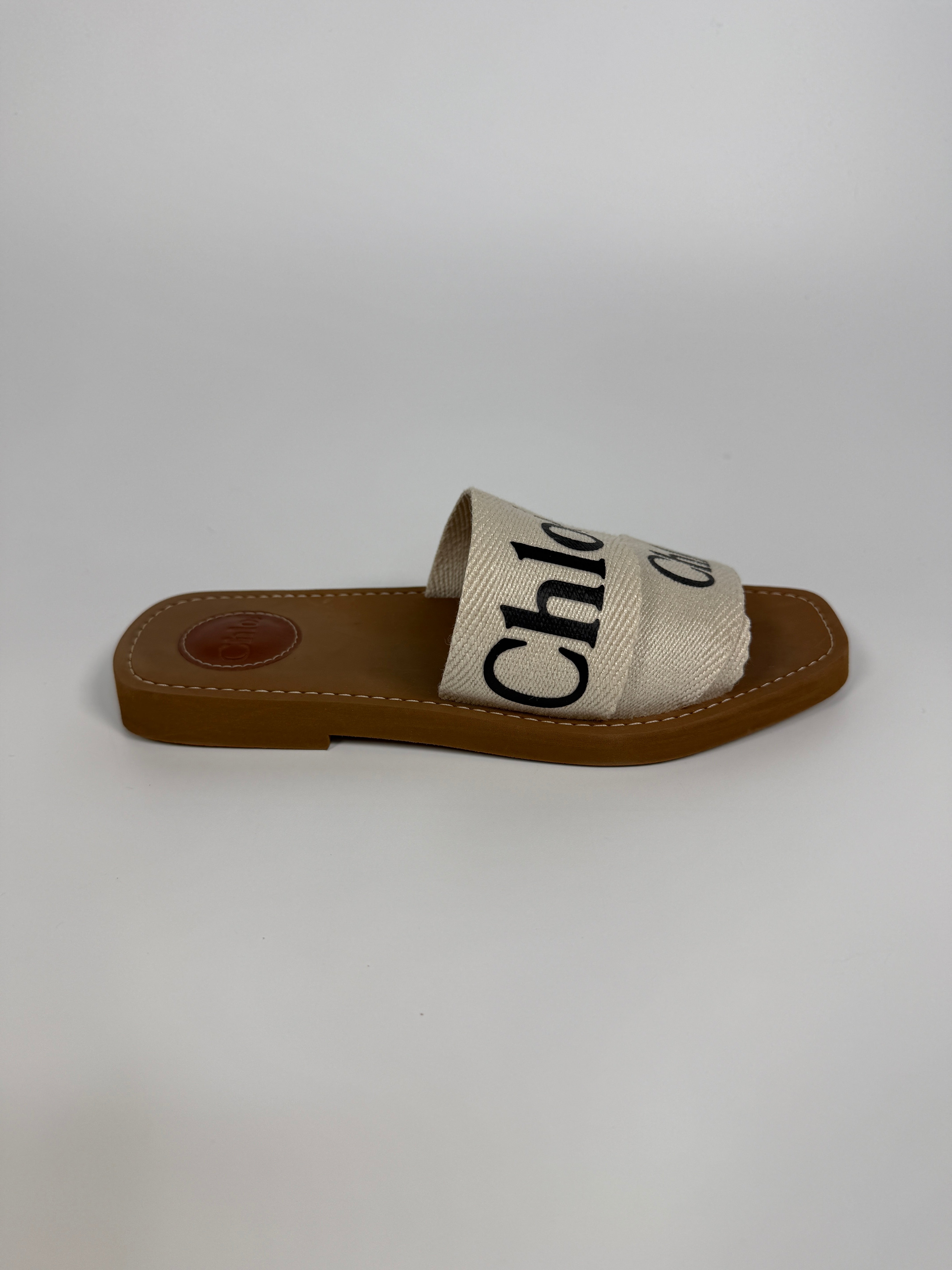 Authentic and preloved Chloe Woody Flat Mule  (Size 37/UK4) Very Good Condition. 100% Authenticity Guarantee 