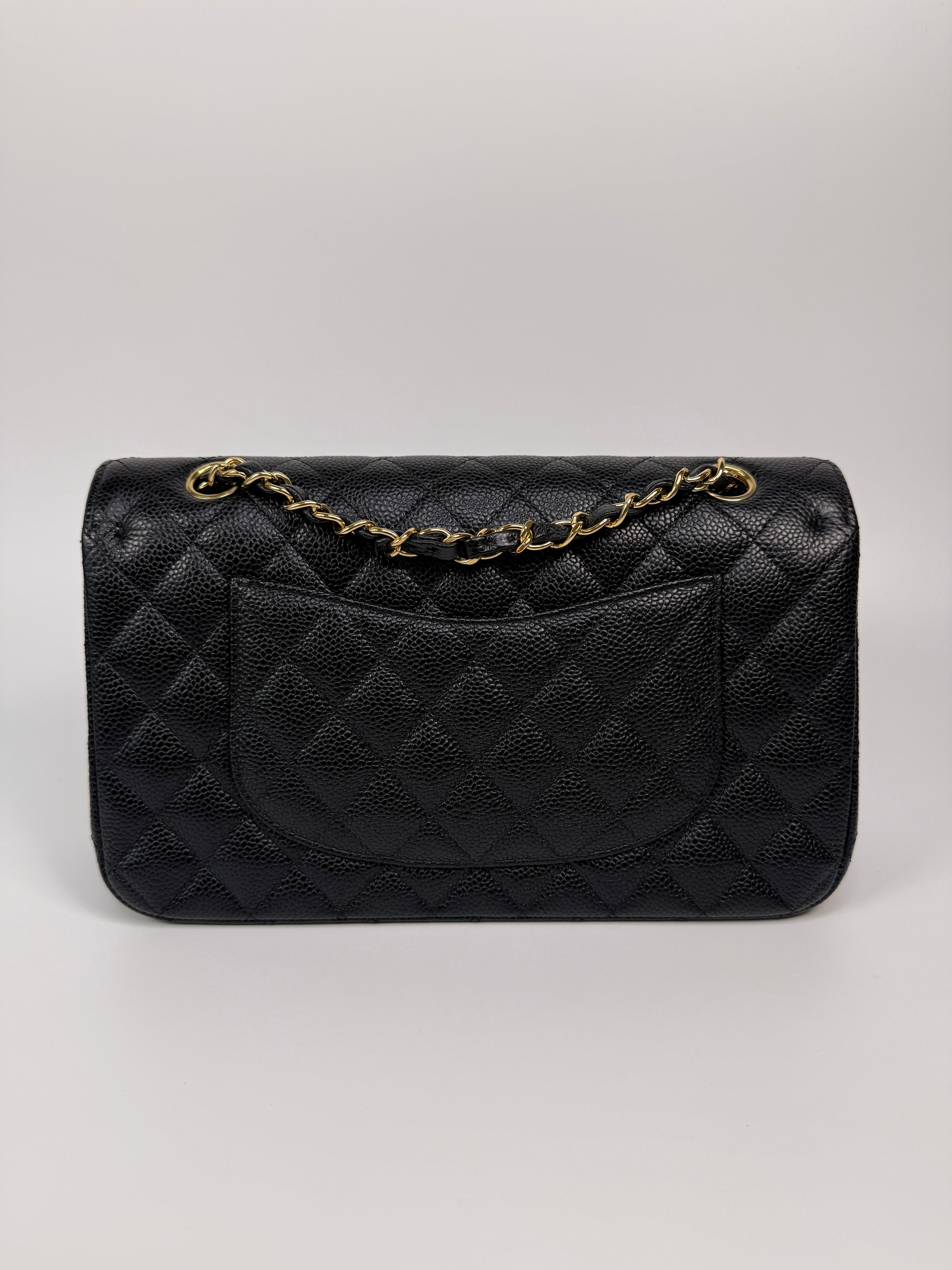 Chanel Medium Classic Double Flap In Black Caviar With Gold Hardware
Authentic Pre Loved Verified by Luxe Cheshire Trusted Designer resale