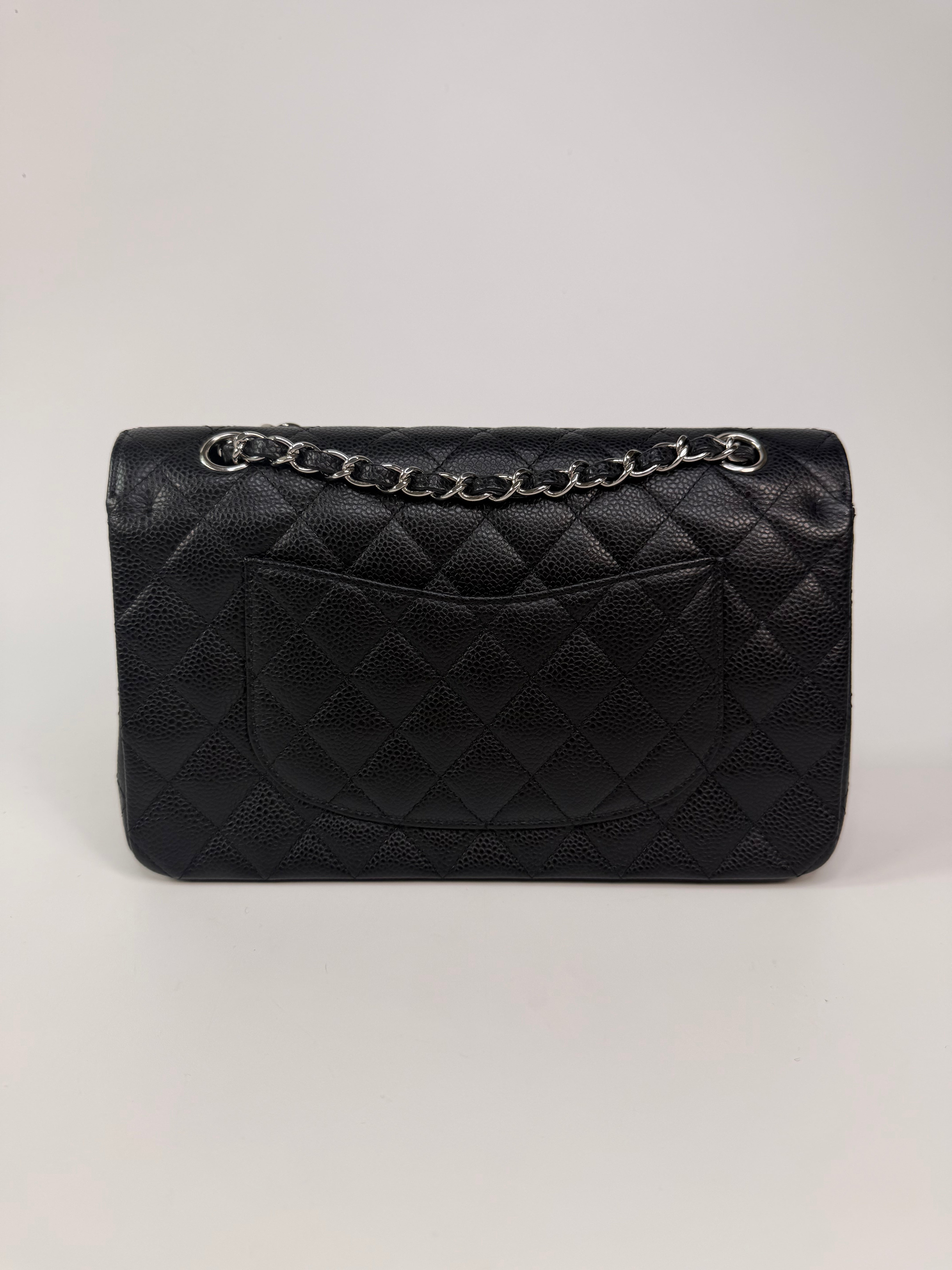 Chanel Vintage Medium Classic Double Flap Black Caviar Silver Hardware. 100% authentic and preloved in excellent condition