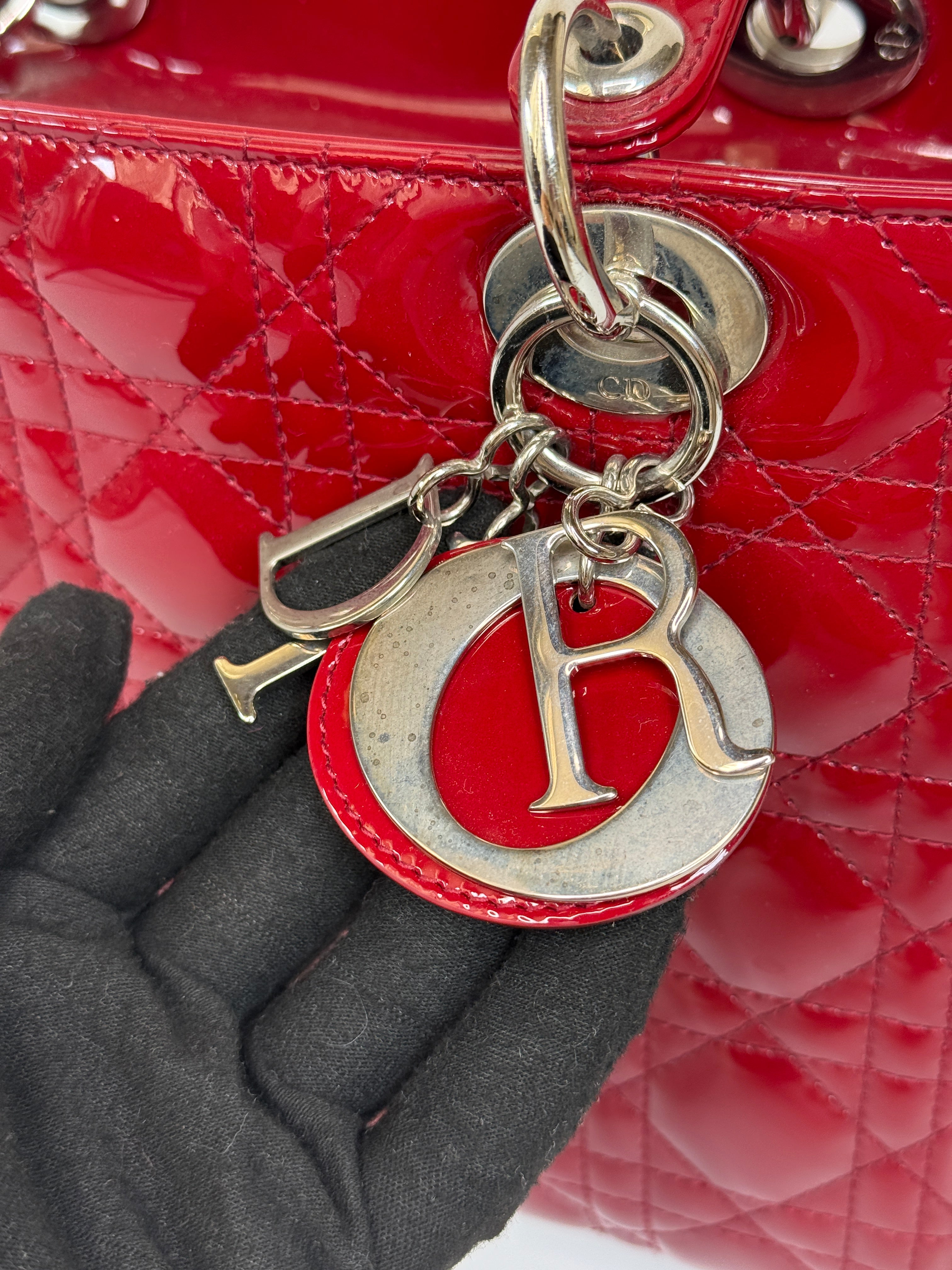 Christian Dior Medium Lady Dior In Patent Red Leather With Silver Hardware Authentic and preloved. 100% Authenticity Guarantee 
