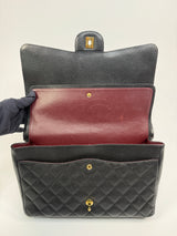 Chanel Maxi Classic Double Flap In Black Caviar Leather With GHW
