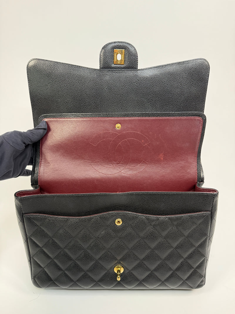 Chanel Maxi Classic Double Flap In Black Caviar Leather With GHW
