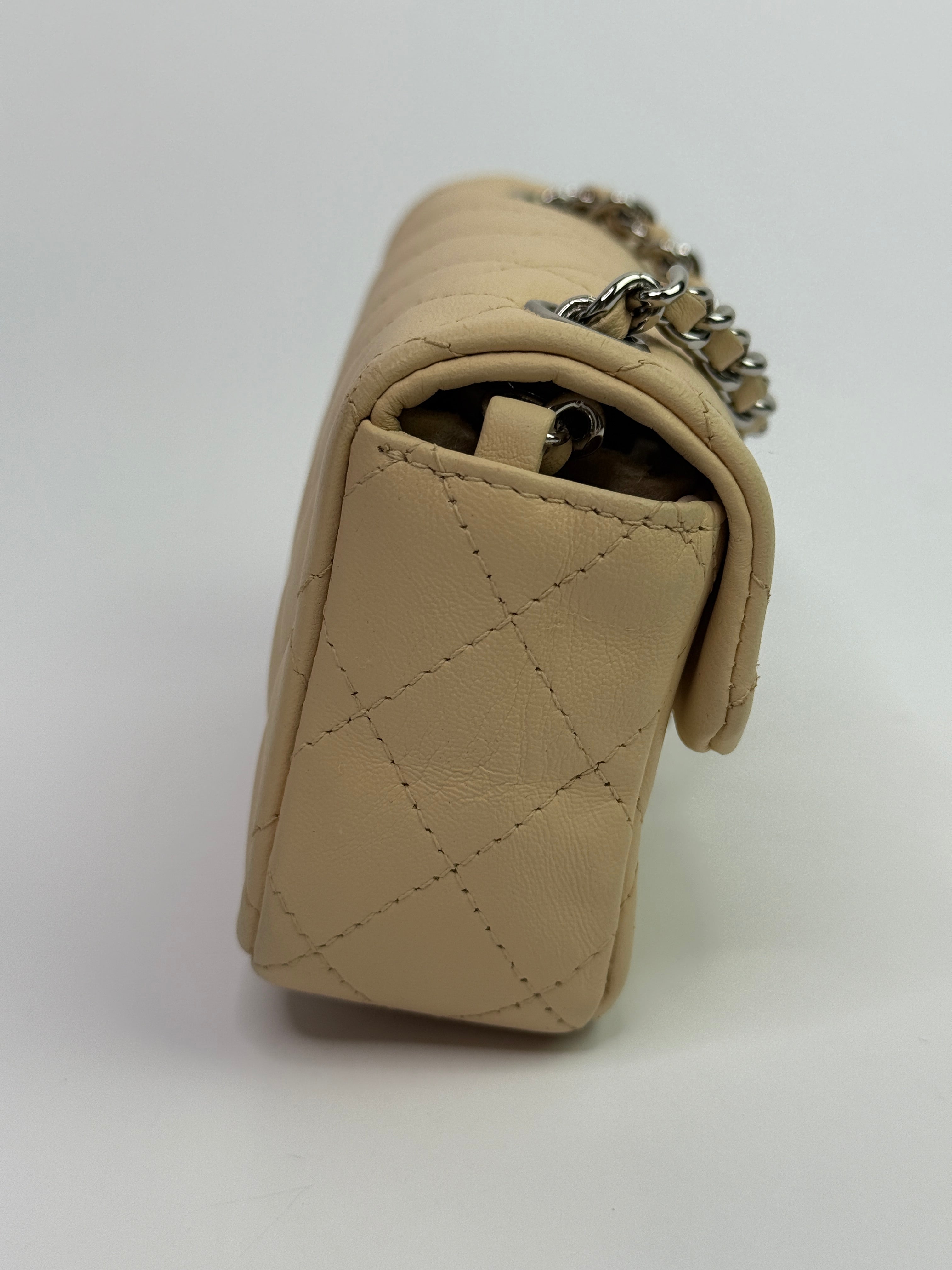 Chanel Super Mini Classic Flap Bag In Beige Lambskin With SHW