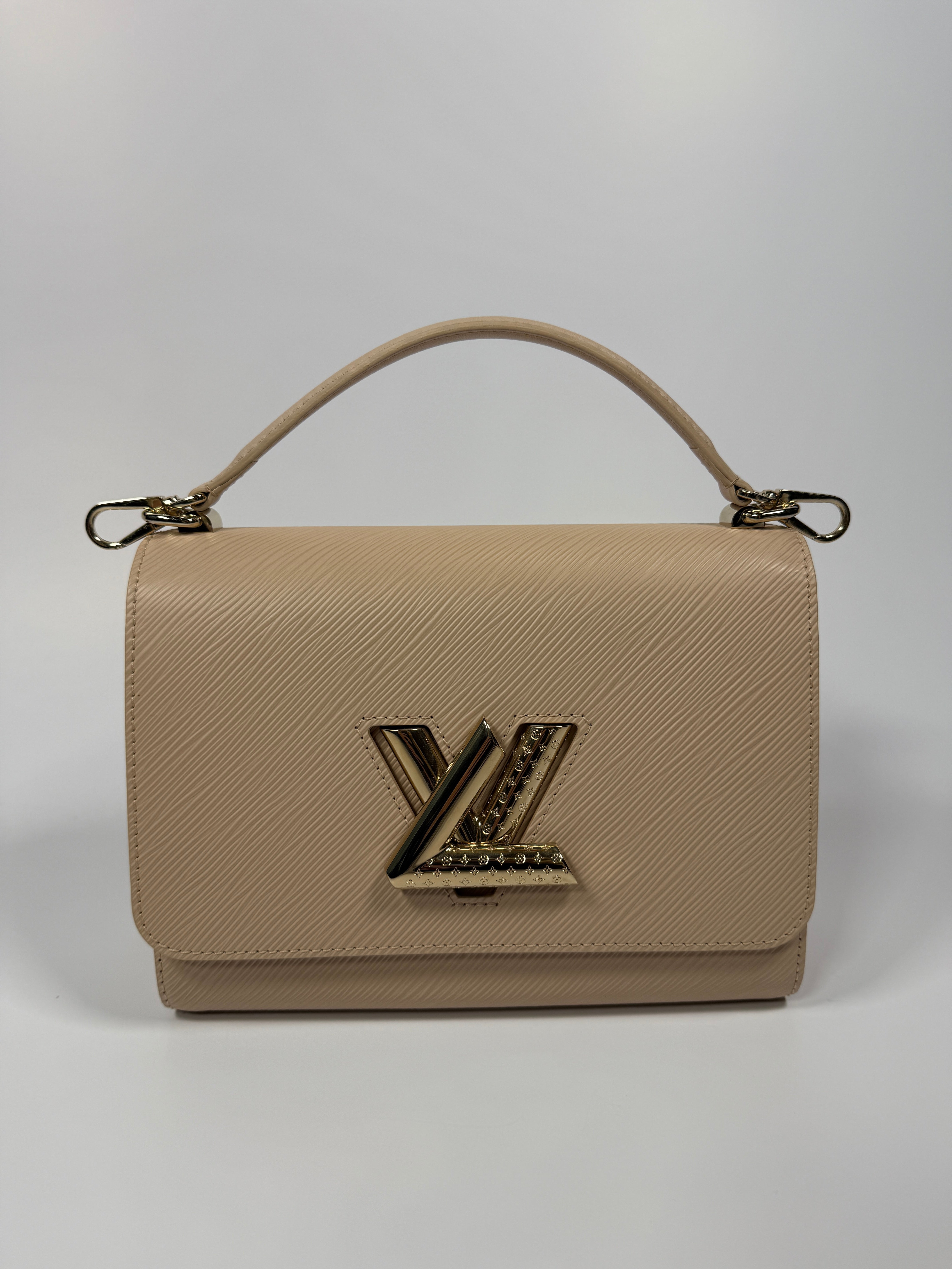 Louis Vuitton Twist MM Bag In Blush Pink Epi Leather 