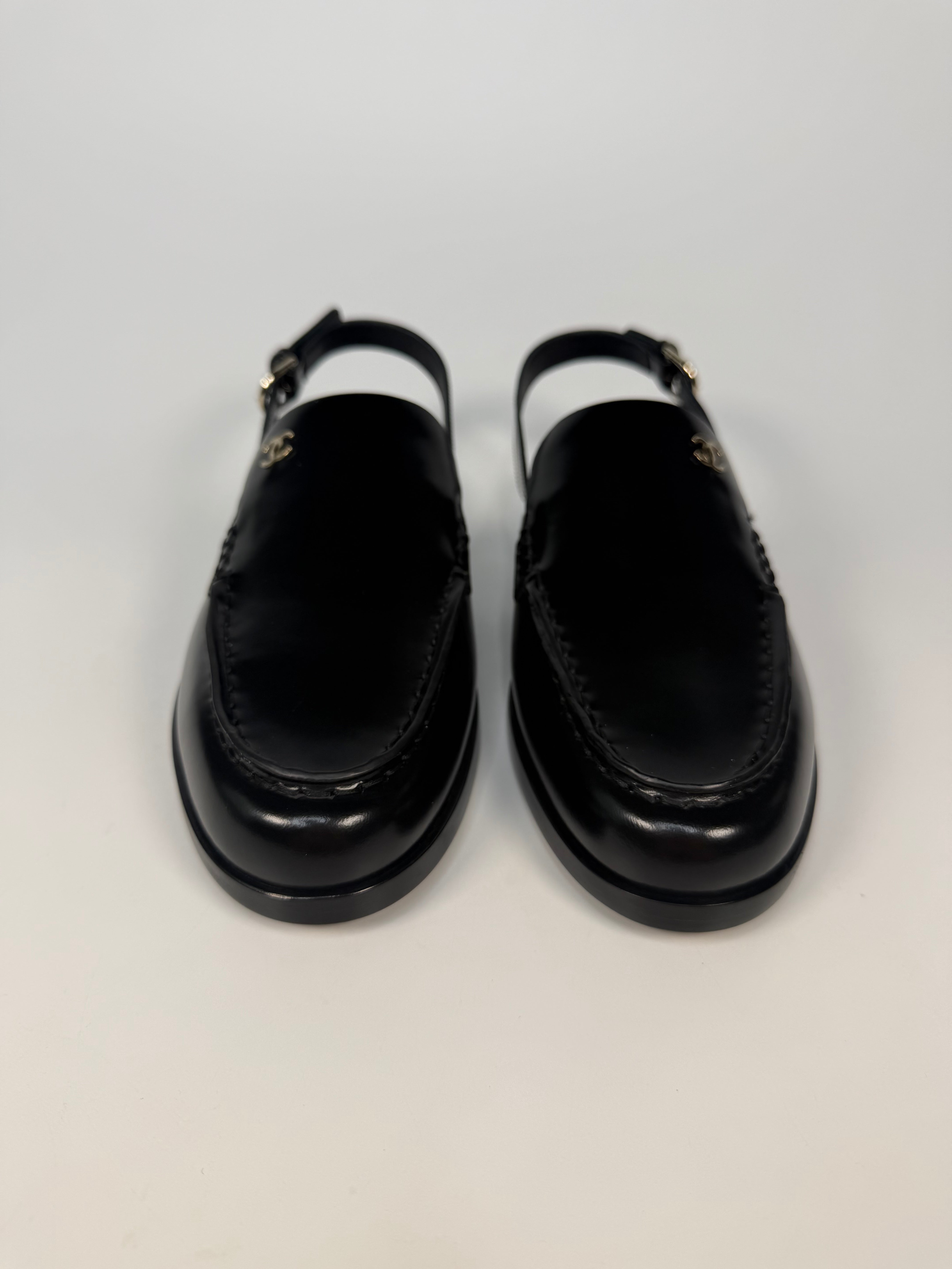 Chanel Spring/Summer Slingback In Black Shiny Calfskin (Size 38.5). Authentic and preloved in new/unused condition. verified by luxe cheshire. insured next day delivery