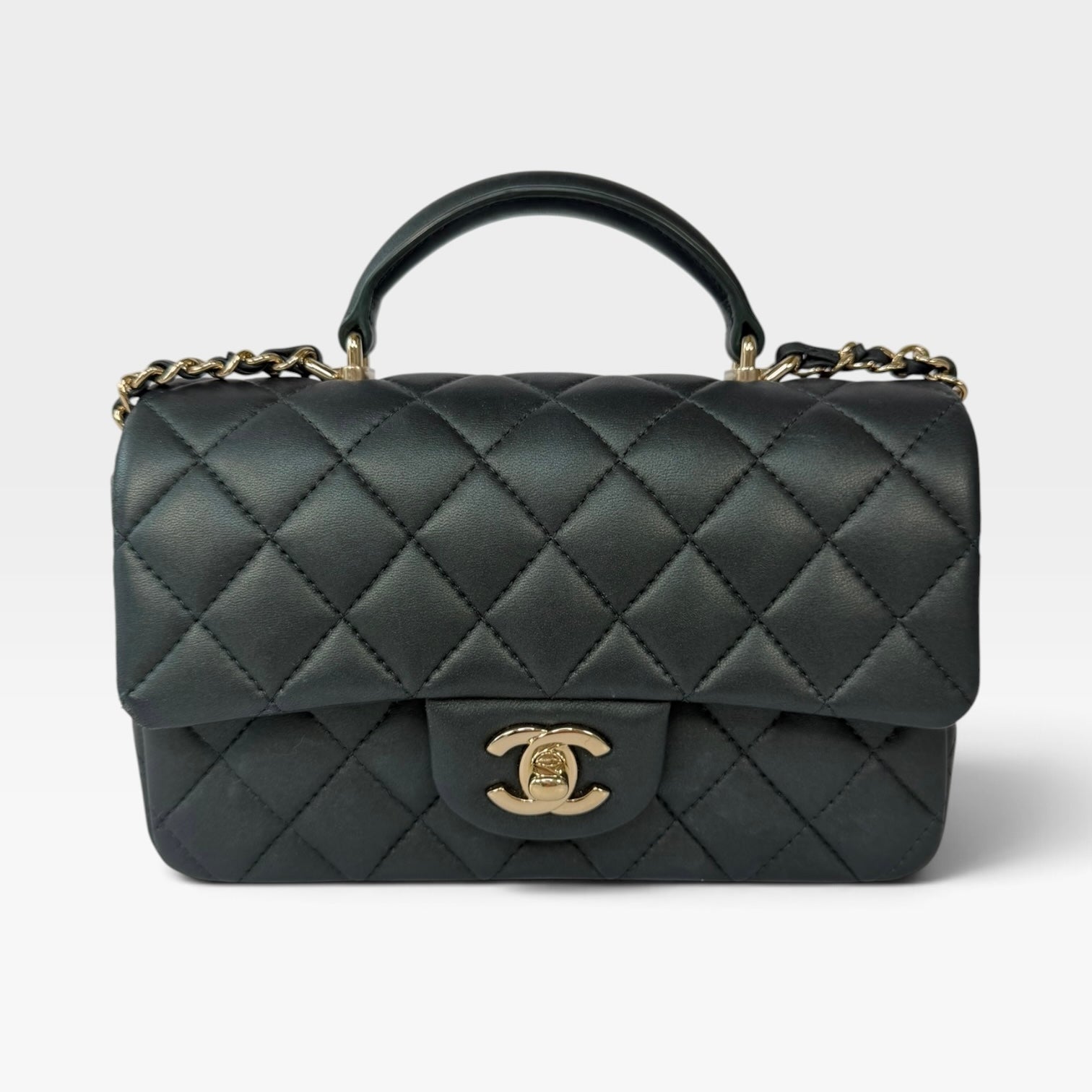 Chanel Mini Rectangle Top Handle In Metallic Green Lambskin Leather Gold Hardware. 100% authentic and preloved in excellent condition.