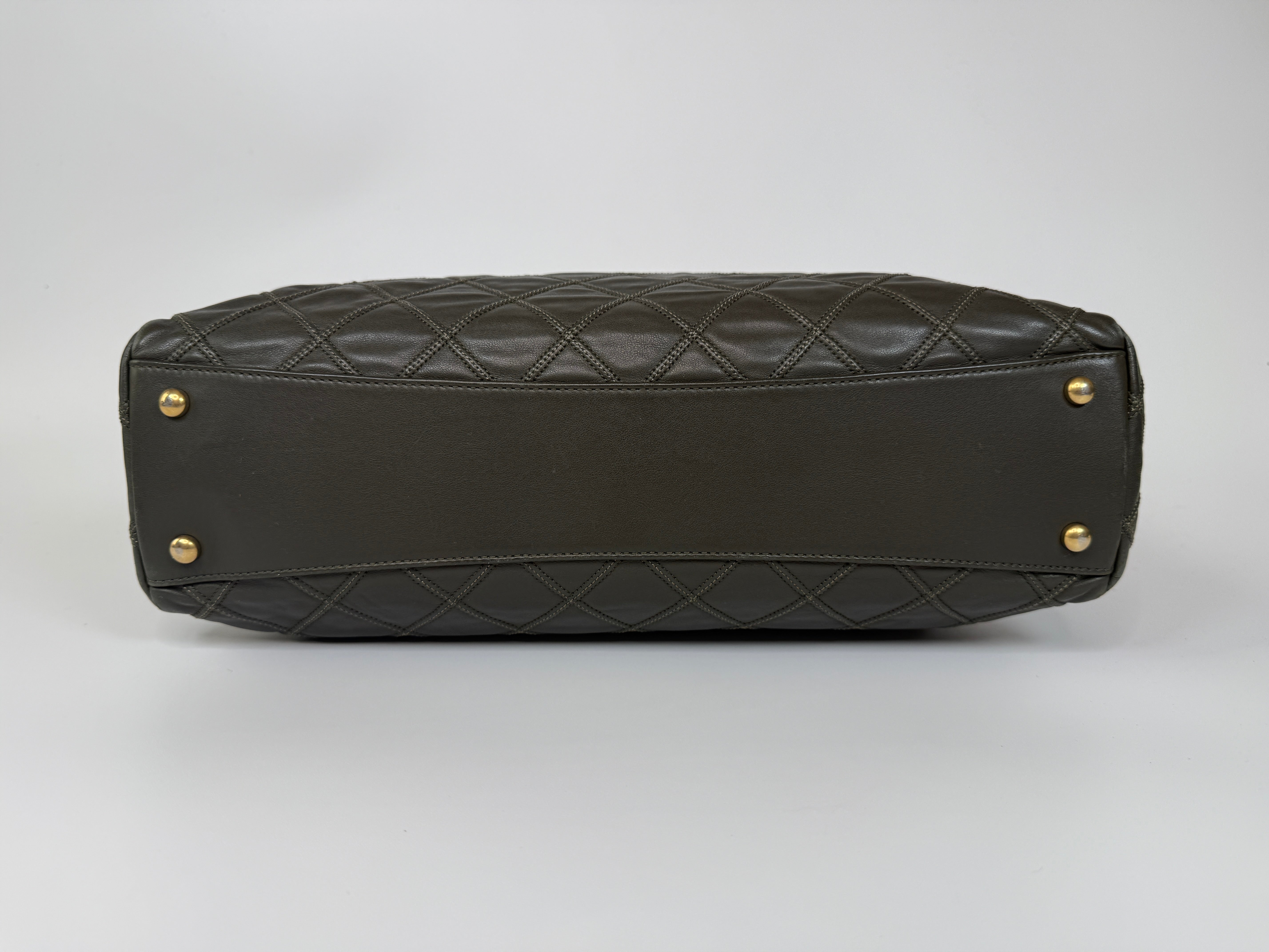 Authentic and preloved Chanel Dark Green Lambskin Leather Tote Bag With Gold Hardware very good condition. 100% Authenticity Guarantee  