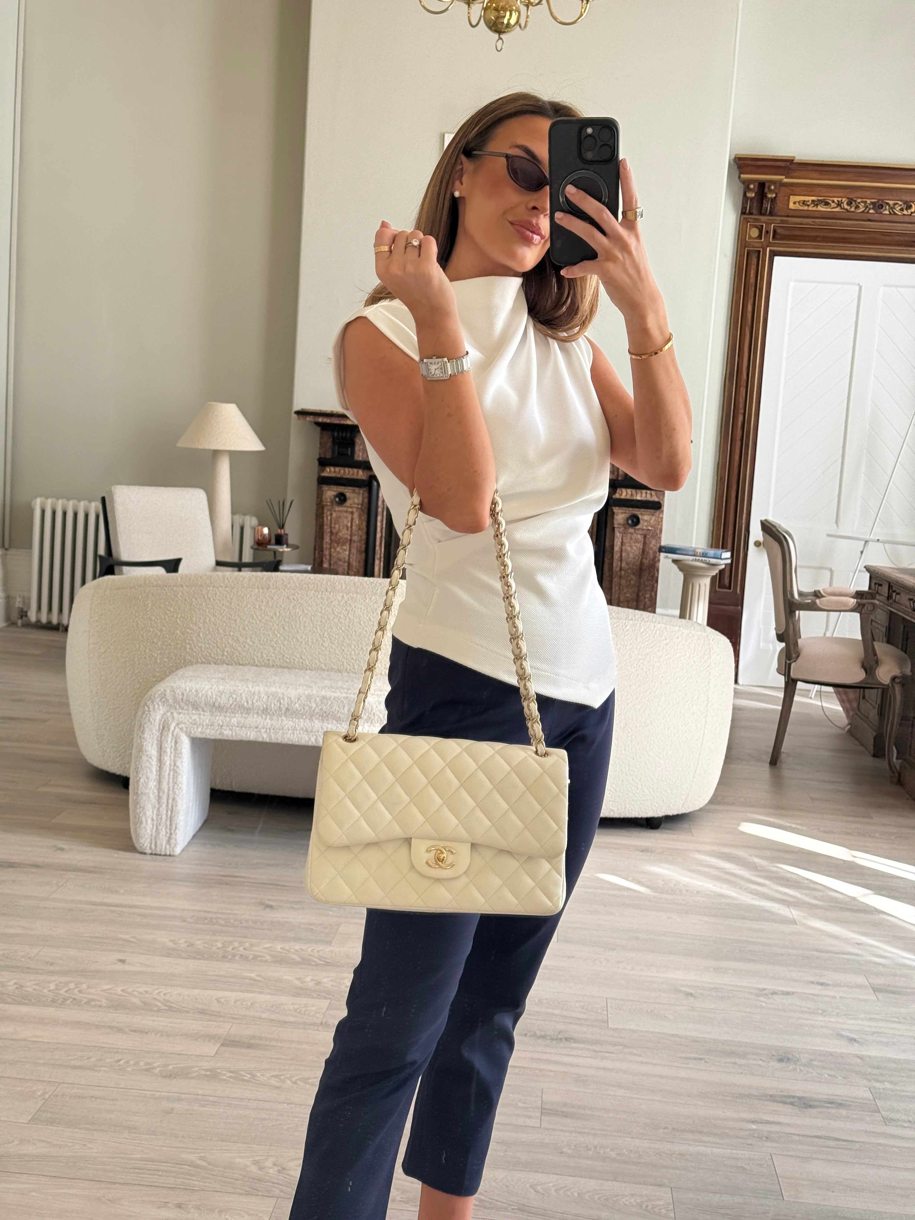 Authentic pre-loved Chanel Classic Jumbo Flap Bag In White Caviar Leather With pale gold  hardware in very good condition. Verified by Luxe Cheshire. International, fast  and fully insured delivery. Trusted designer resale.
