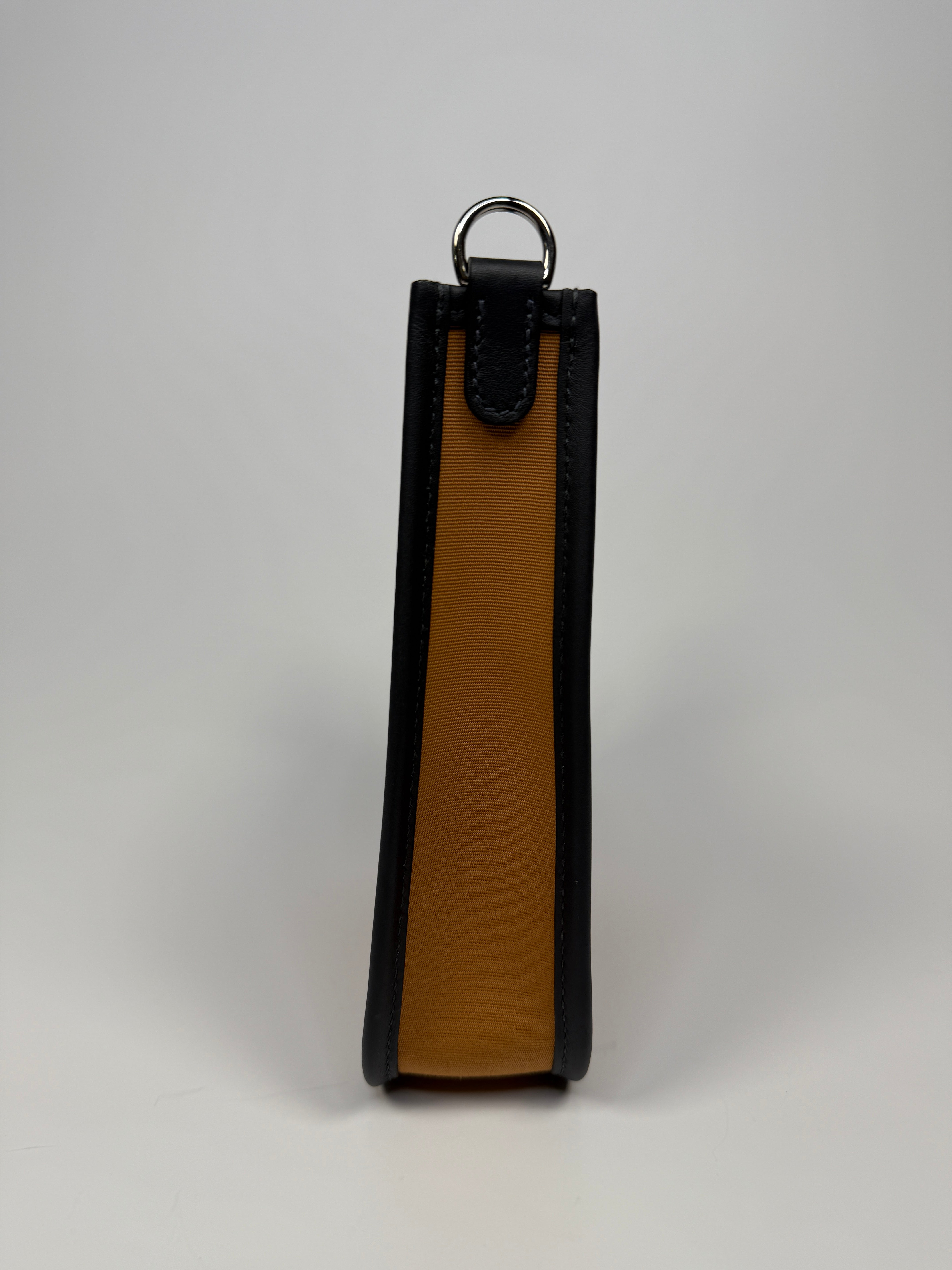 Hermès Evelyne TPM In Dune Cassis & Caban With Palladium hardware. Authentic and preloved. New condition.