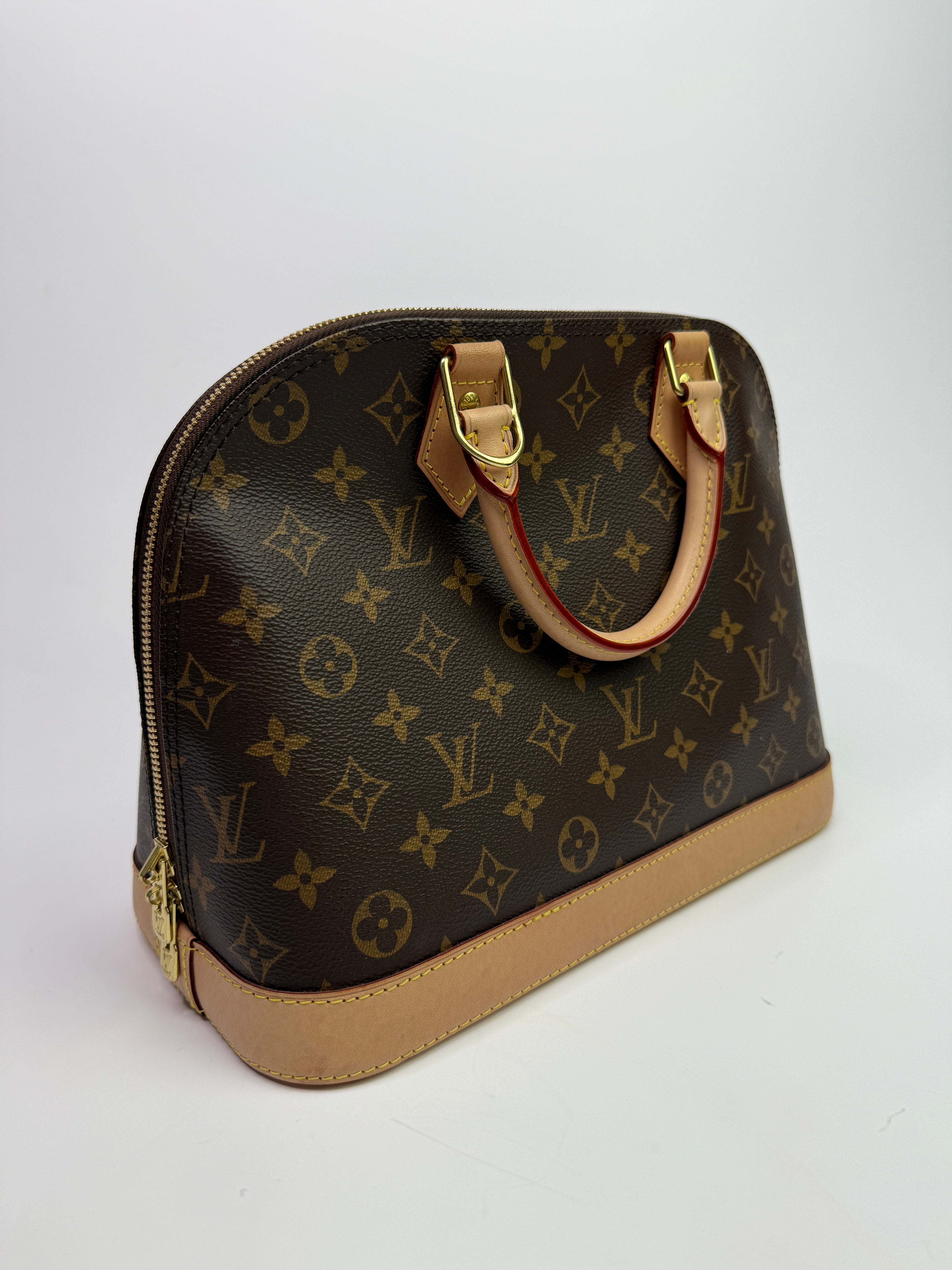 Louis Vuitton Monogram Alma PM Handbag