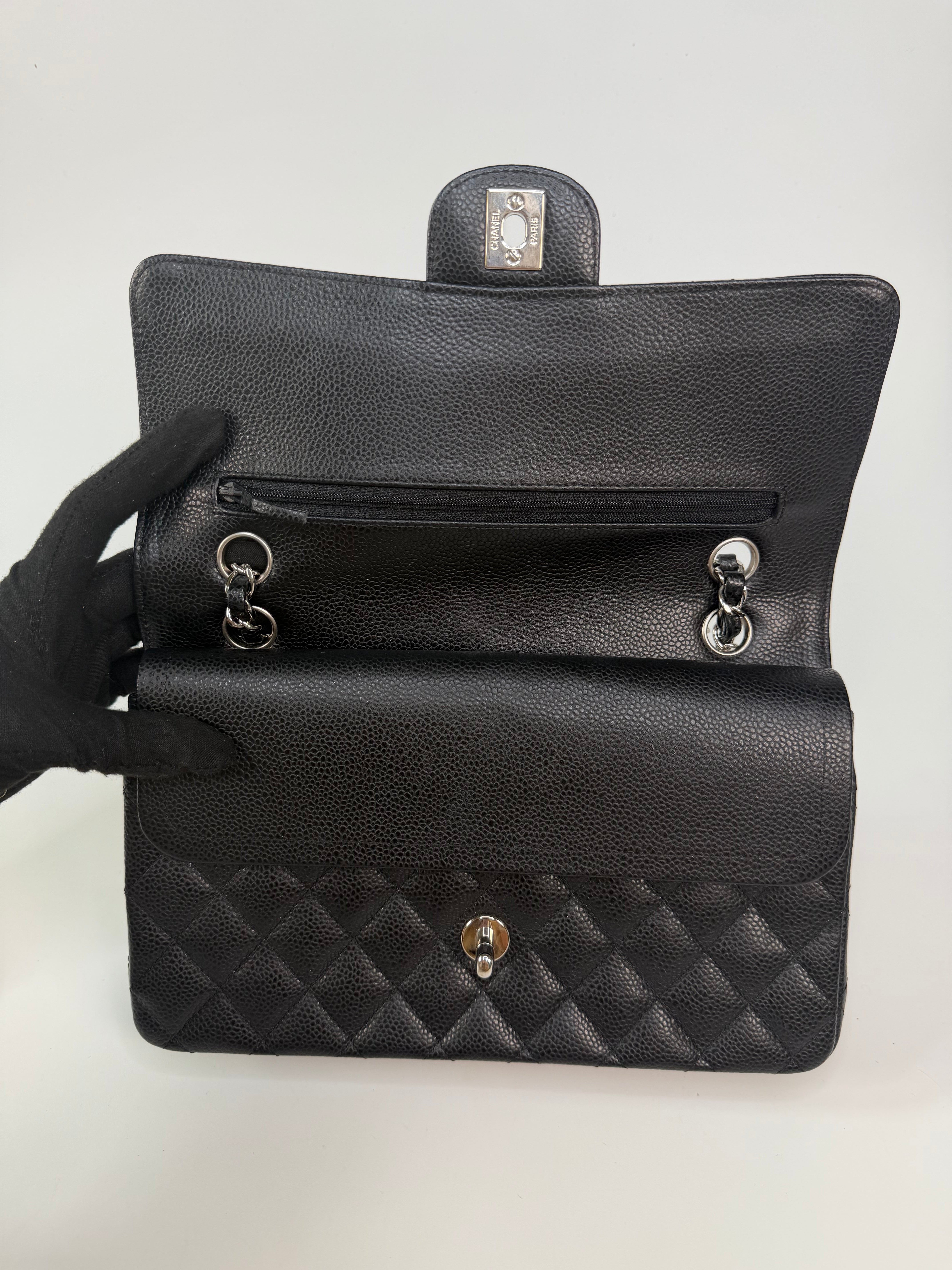 Chanel Vintage Medium Classic Double Flap Black Caviar Silver Hardware. 100% authentic and preloved in excellent condition