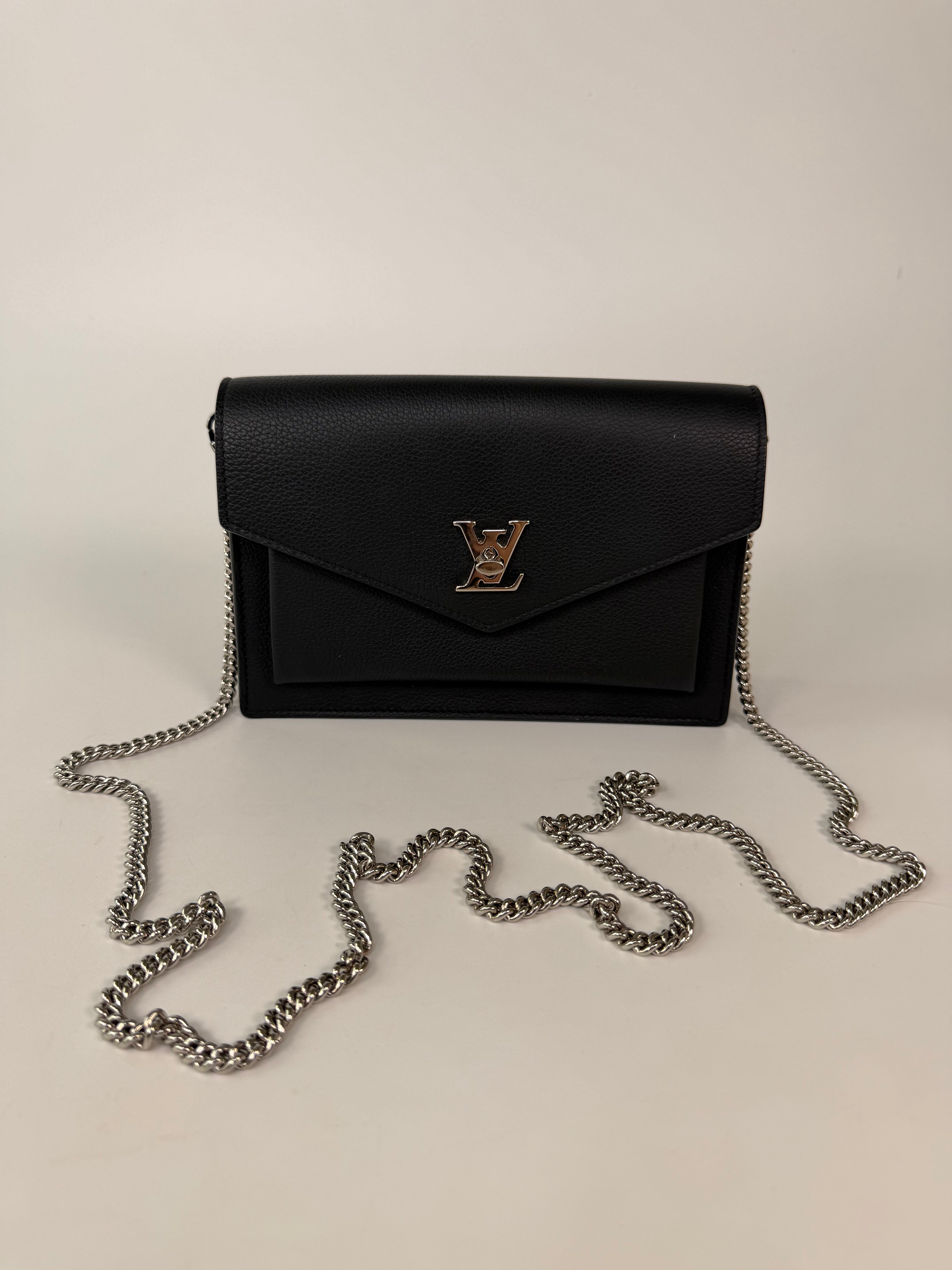 Louis Vuitton Pochette Chain MyLockMe In Black Leather With Silver Hardware in excellent condition 100% authentic and preloved 