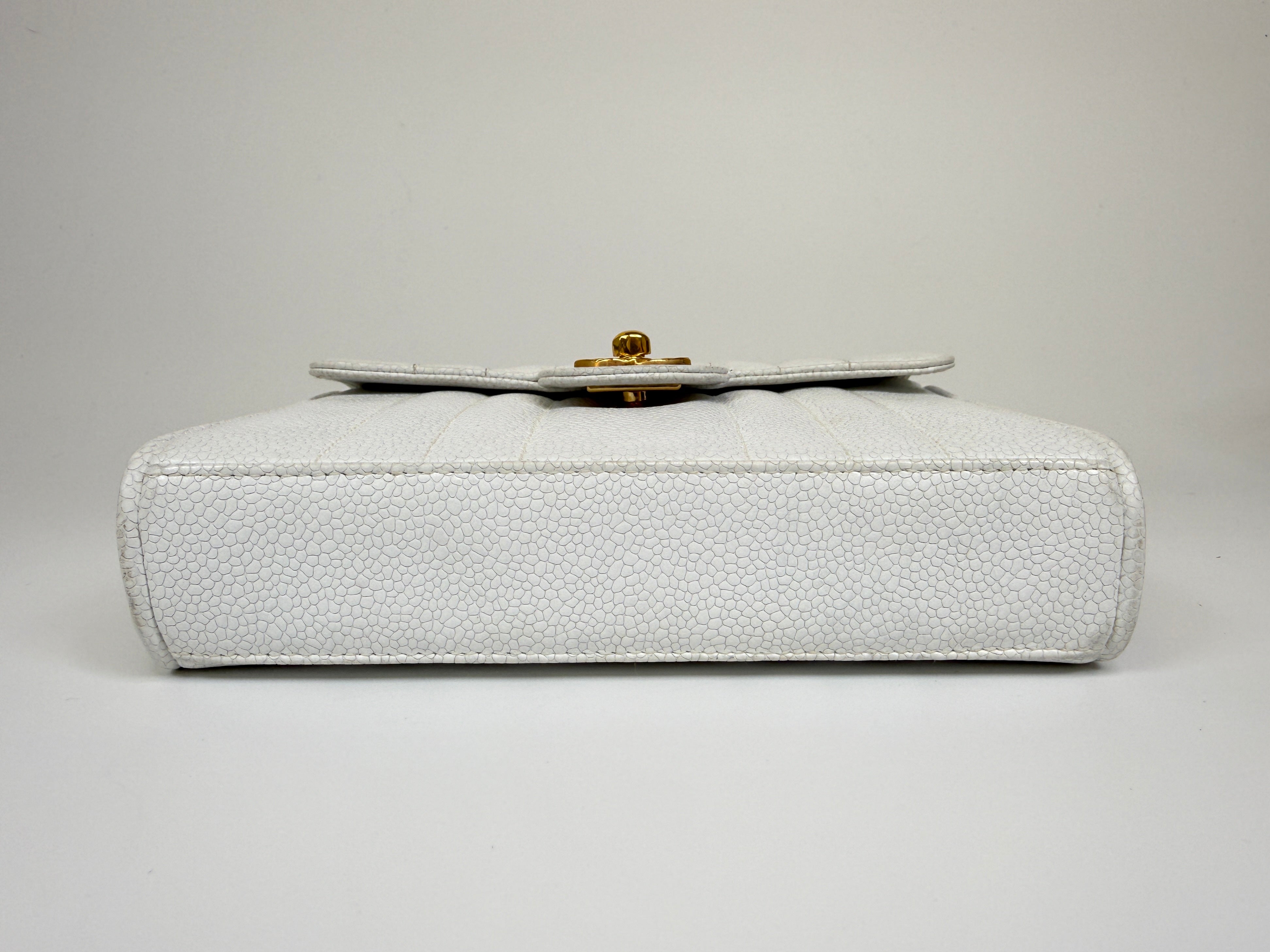 Chanel Vintage Mini Square Flap In White Caviar Leather With 24kt Gold Hardware. Excellent condition 100% Authenticity Guarantee 