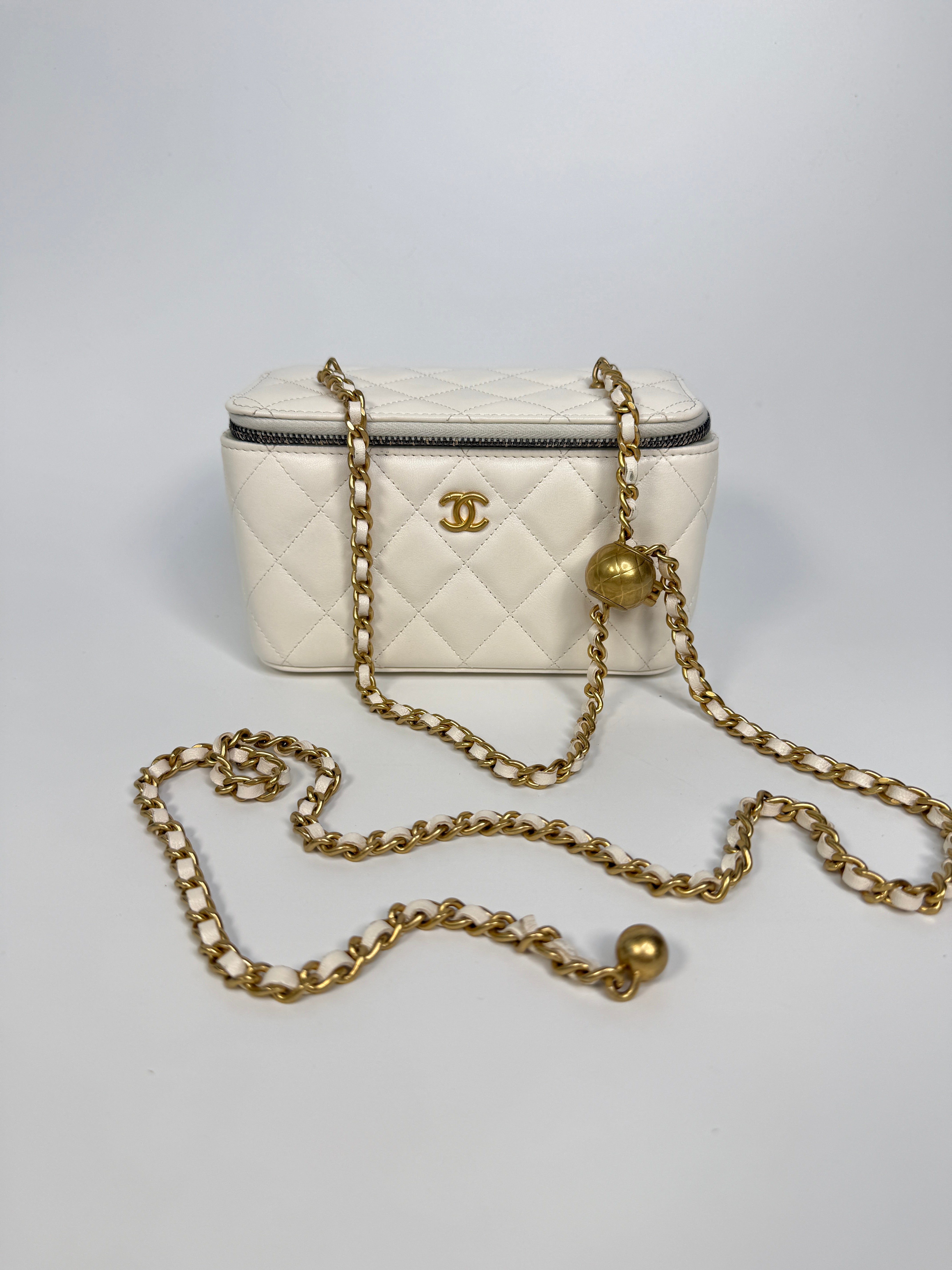 Authentic and preloved Chanel Quilted Pearl Crush Mini Vanity In White Lambskin Leather With Aged Gold Hardware