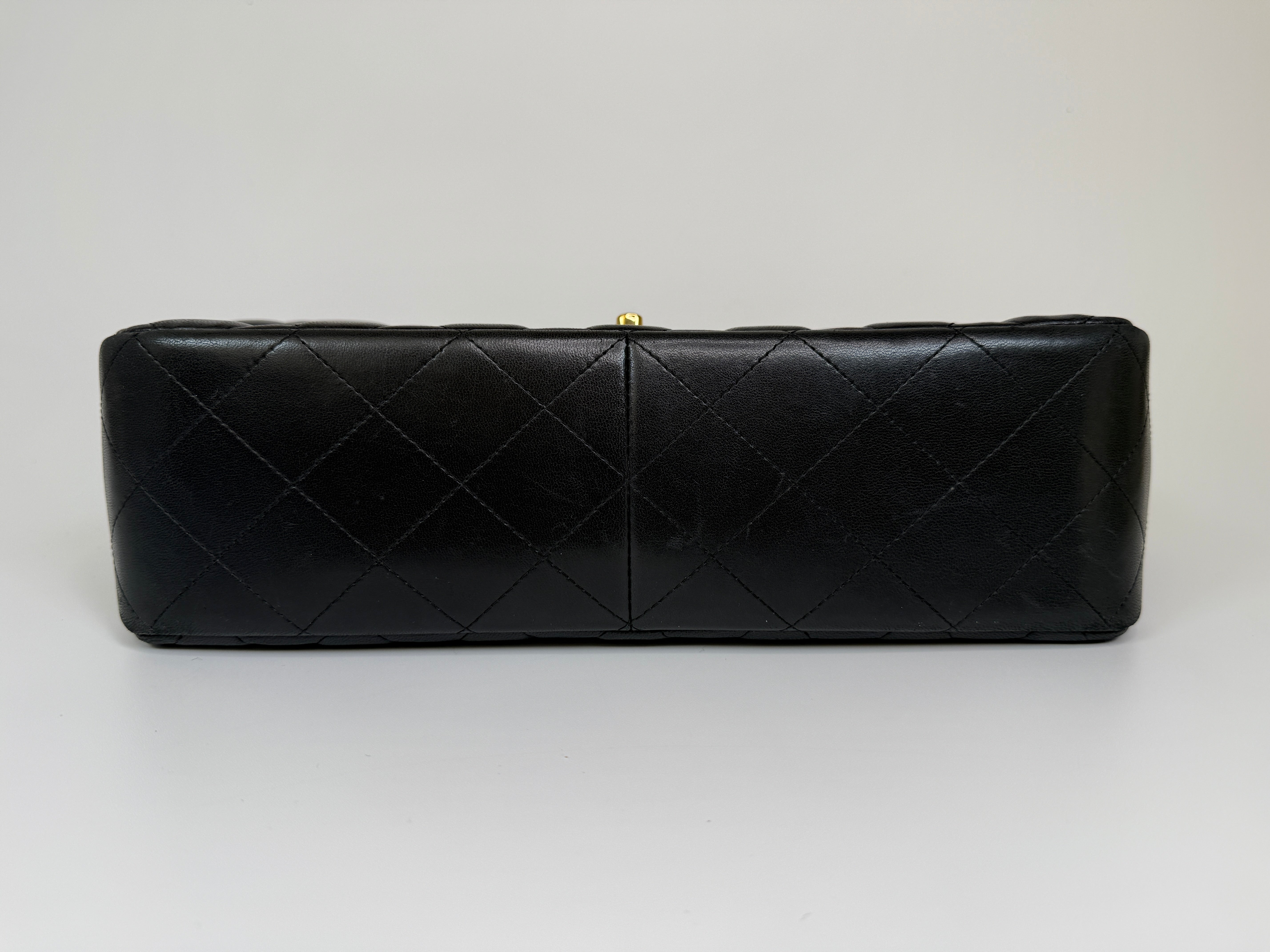 Authentic and preloved Chanel Jumbo Classic Flap Bag In Black Lambskin Leather With GOLD Hardware. Excellent condition. 100% Authenticity Guarantee 