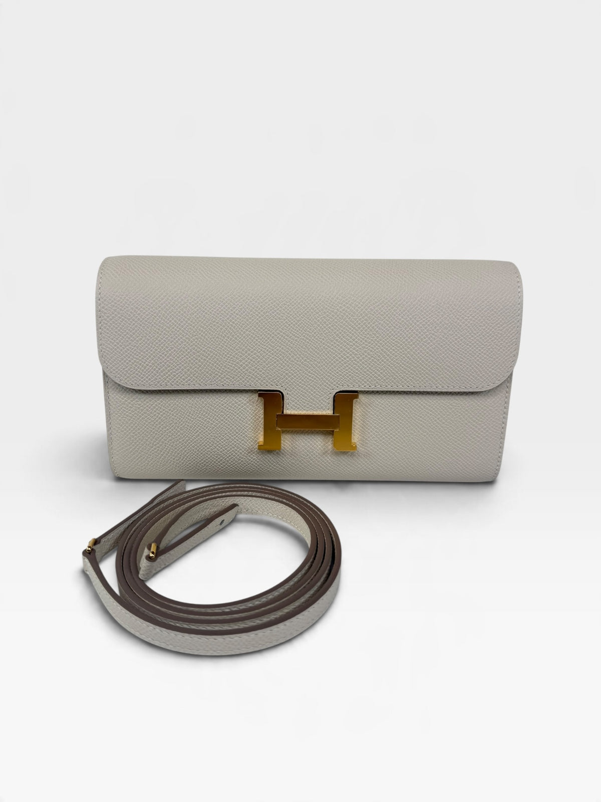 Hermès Constance To Go In Craie Epsom Leather With Gold Hardware. Authentic and preloved in new and unused condition. Verified by Luxe Cheshire. 100% Guarantee