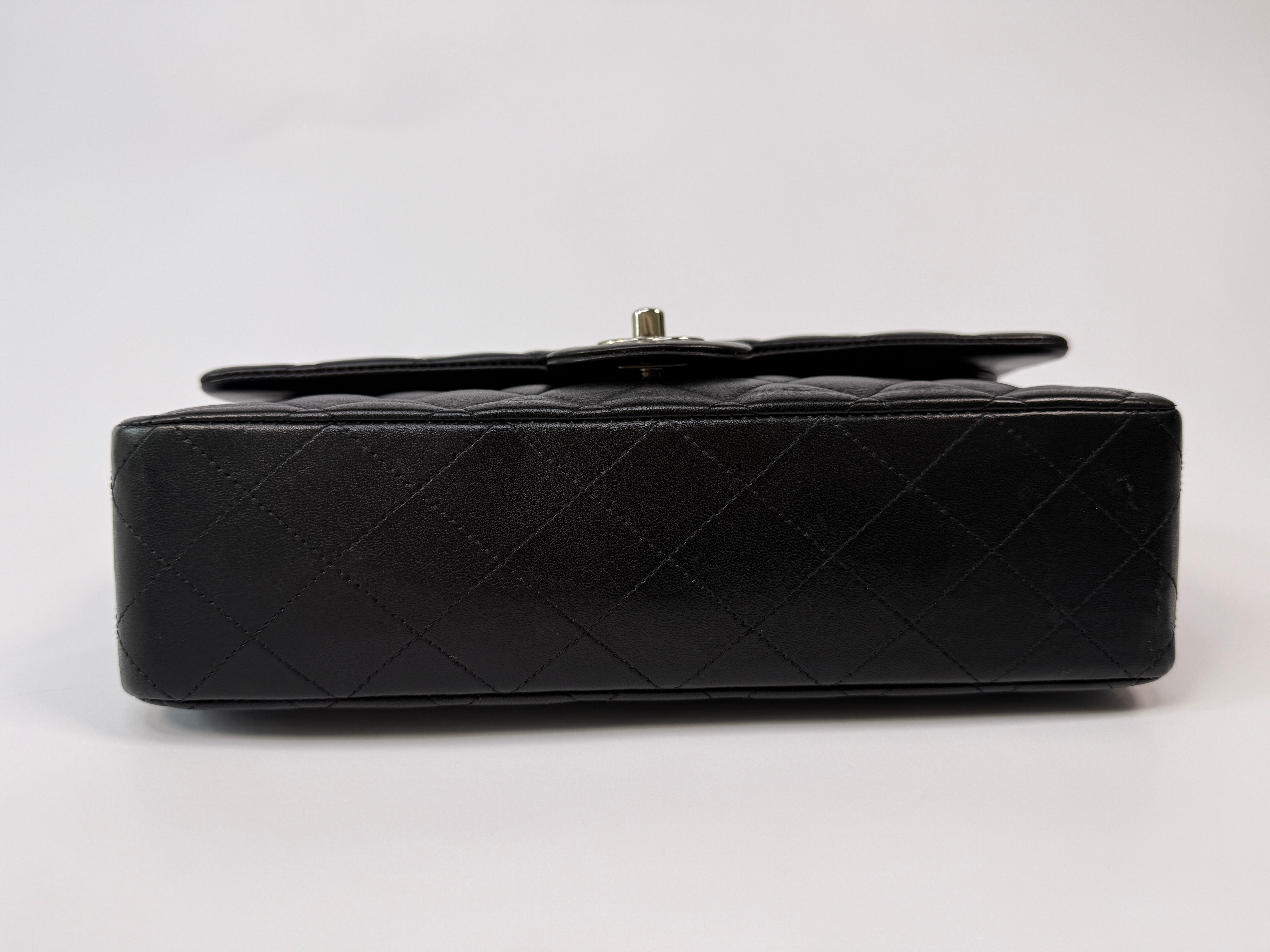 Chanel Medium Classic Double Flap Black Lambskin Leather With Silver Hardware
Pre Loved & Authentic