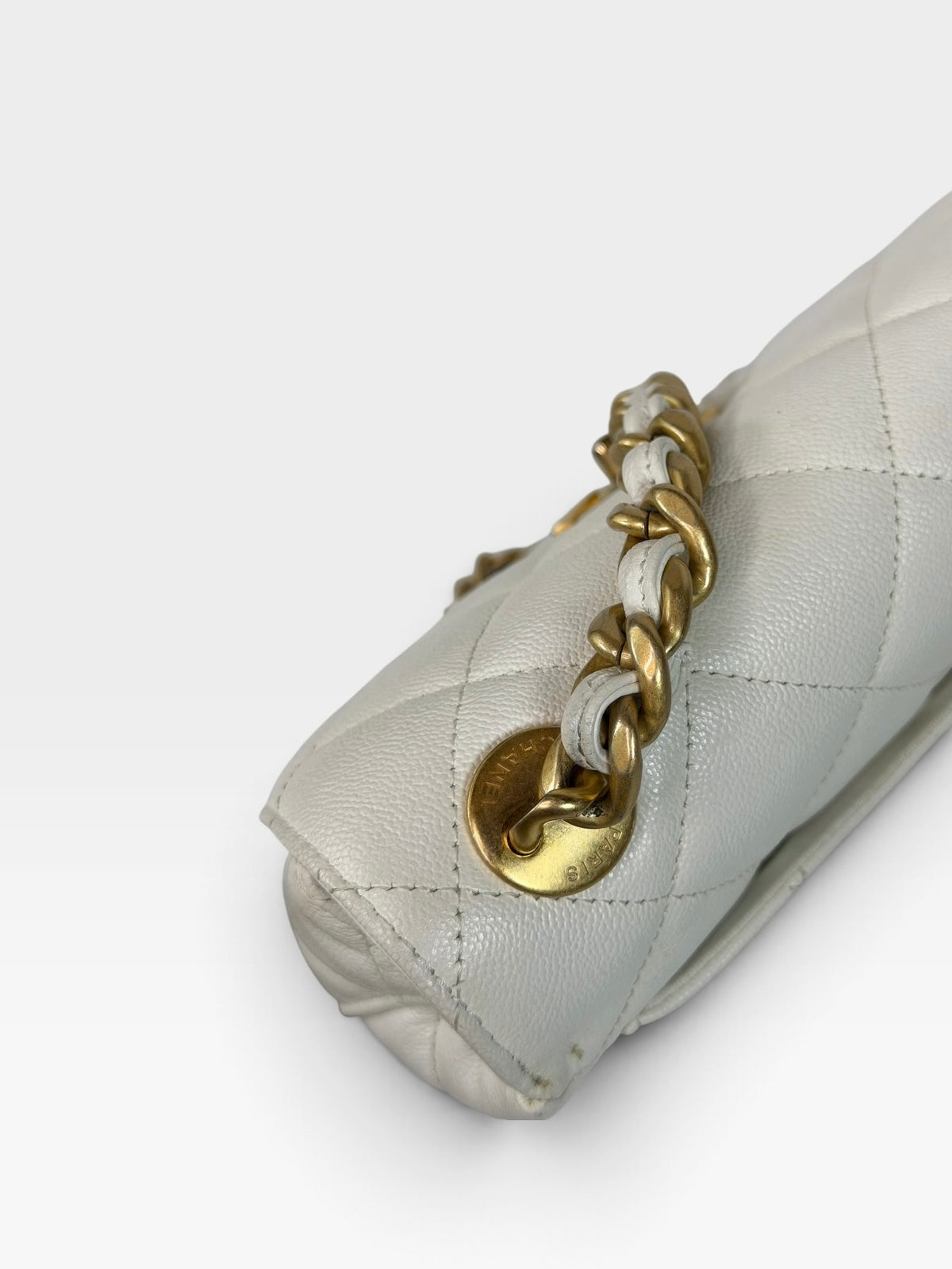 Chanel Mini Flap In White Caviar Leather With Gold Hardware 100% authentic and preloved in excellent condition