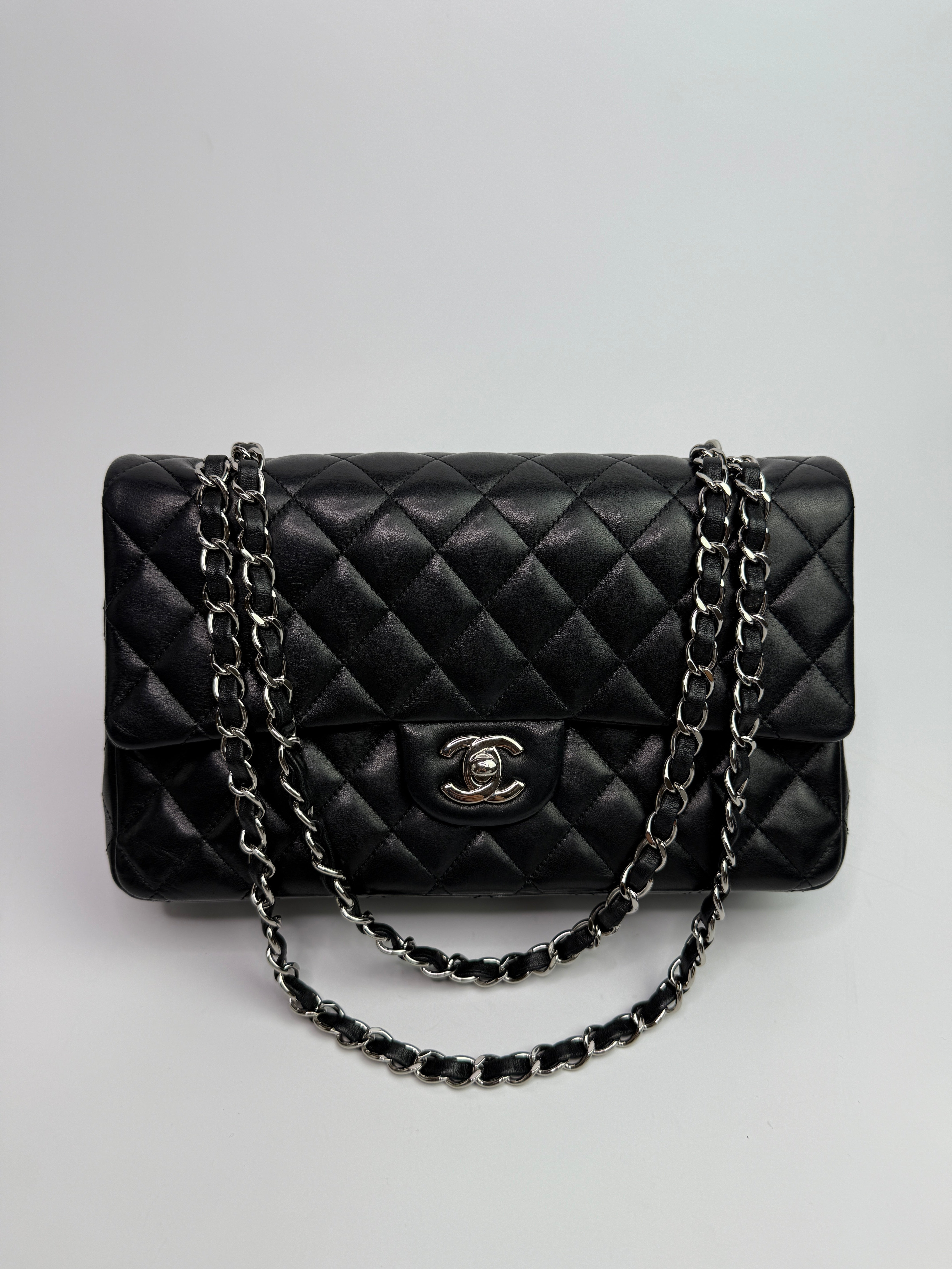Chanel Medium Classic Double Flap Black Lambskin With Silver Hardware
Pre Loved & Authentic 