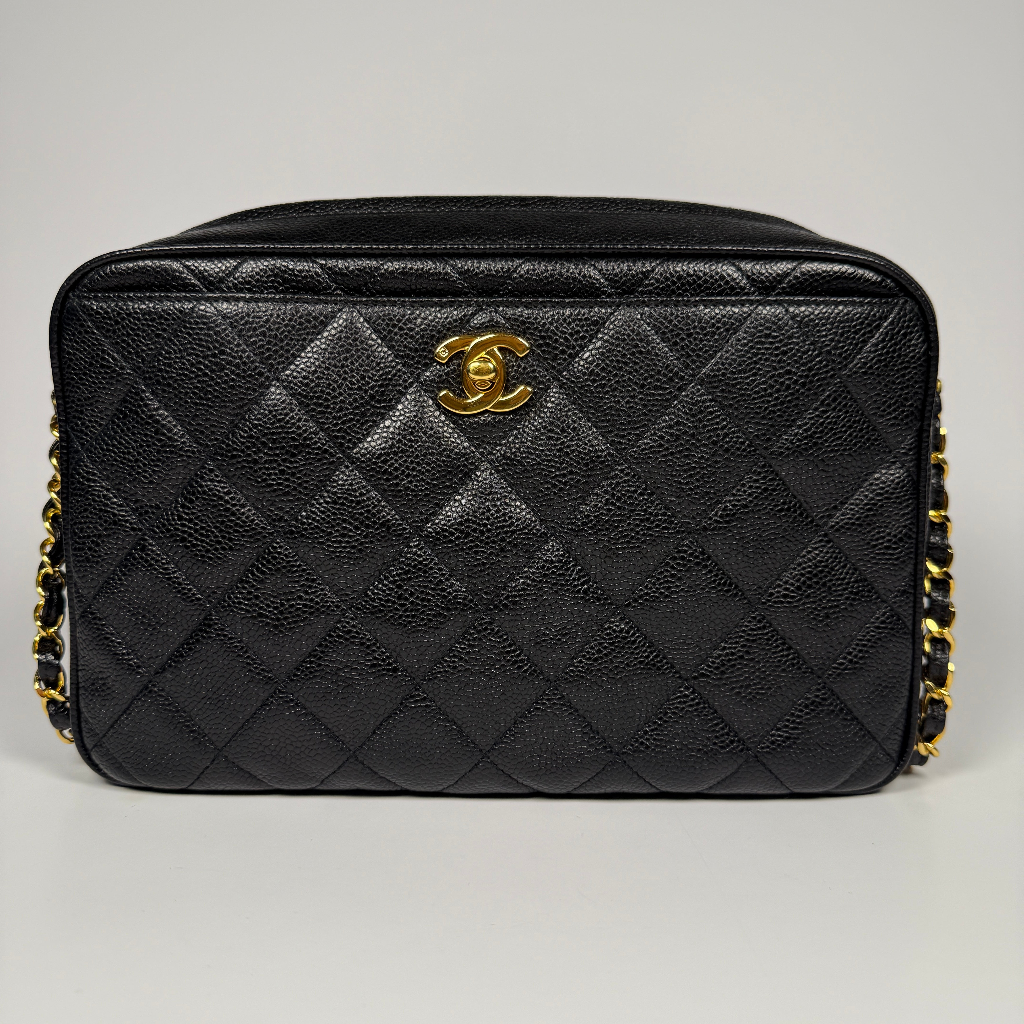 Chanel Vintage Quilted Camera Bag In Black Caviar Leather With 24kt GHW/. 100% Authentic and preloved in very good condition.