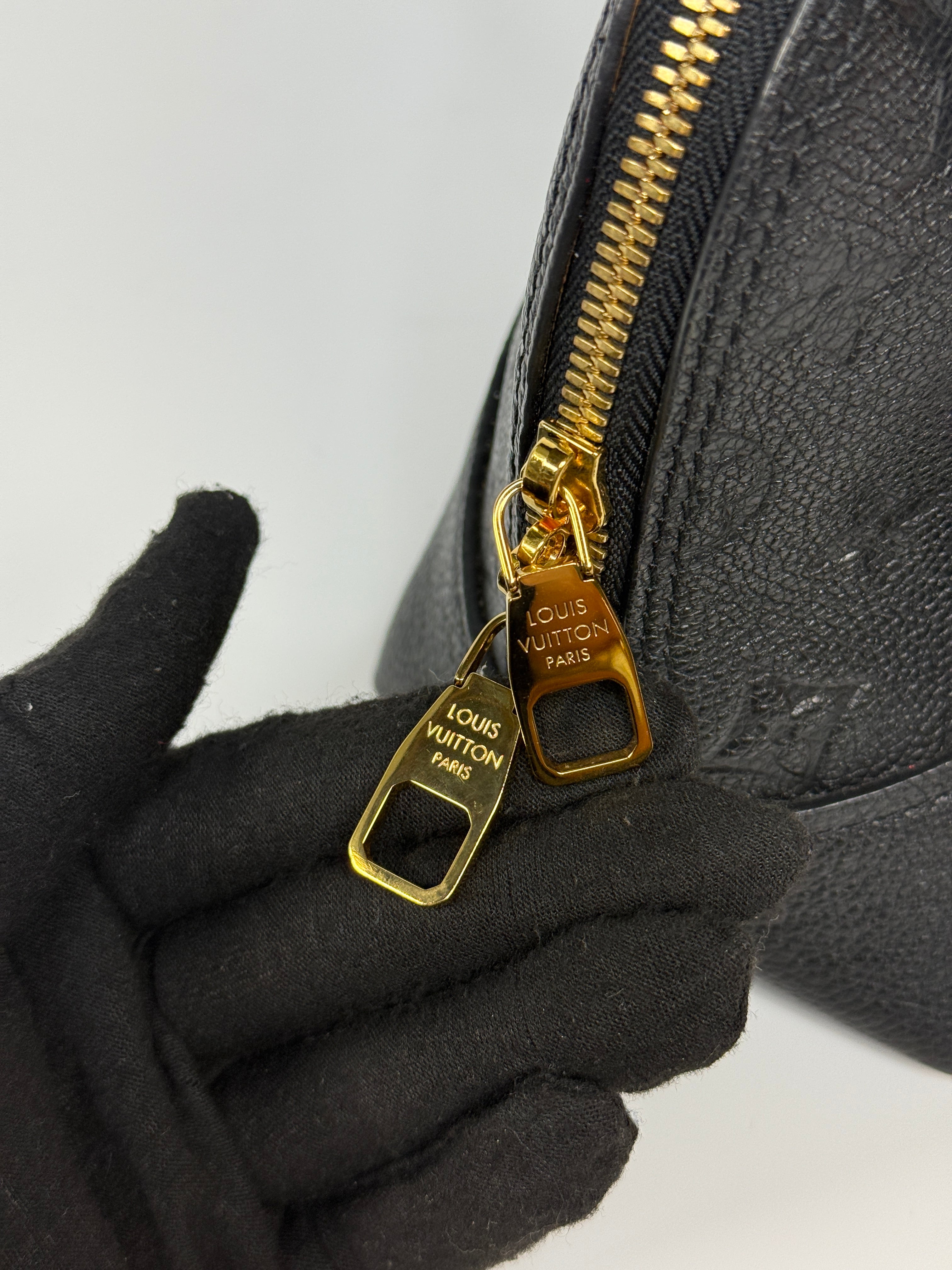 Authentic and preloved Louis Vuitton Alma BB In Empreinte Black Monogram With Gold Hardware