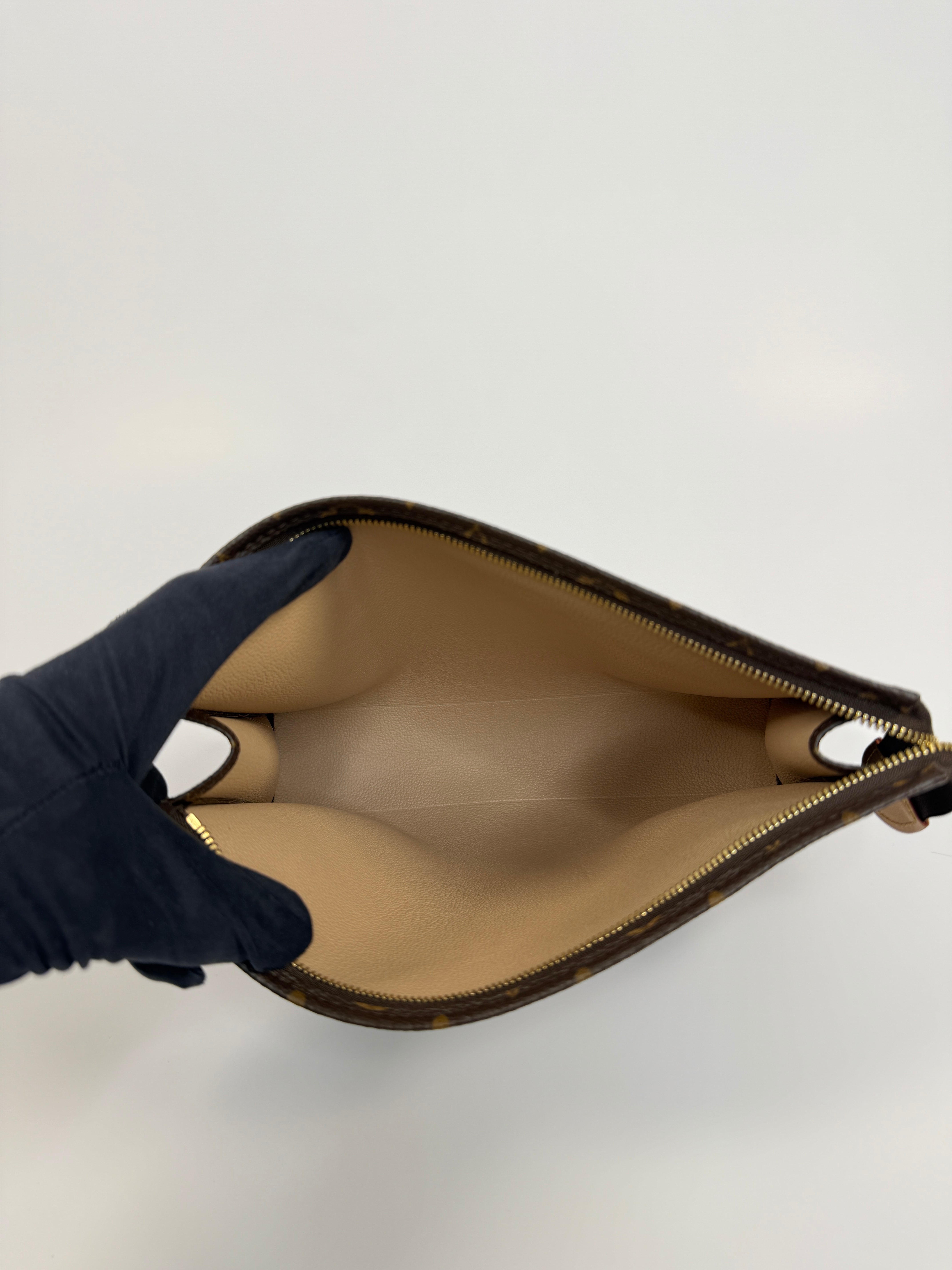 Authentic and preloved Louis Vuitton Monogram Toiletry 26 Pouch In Brown Monogram With Gold Hardware in excellent condition