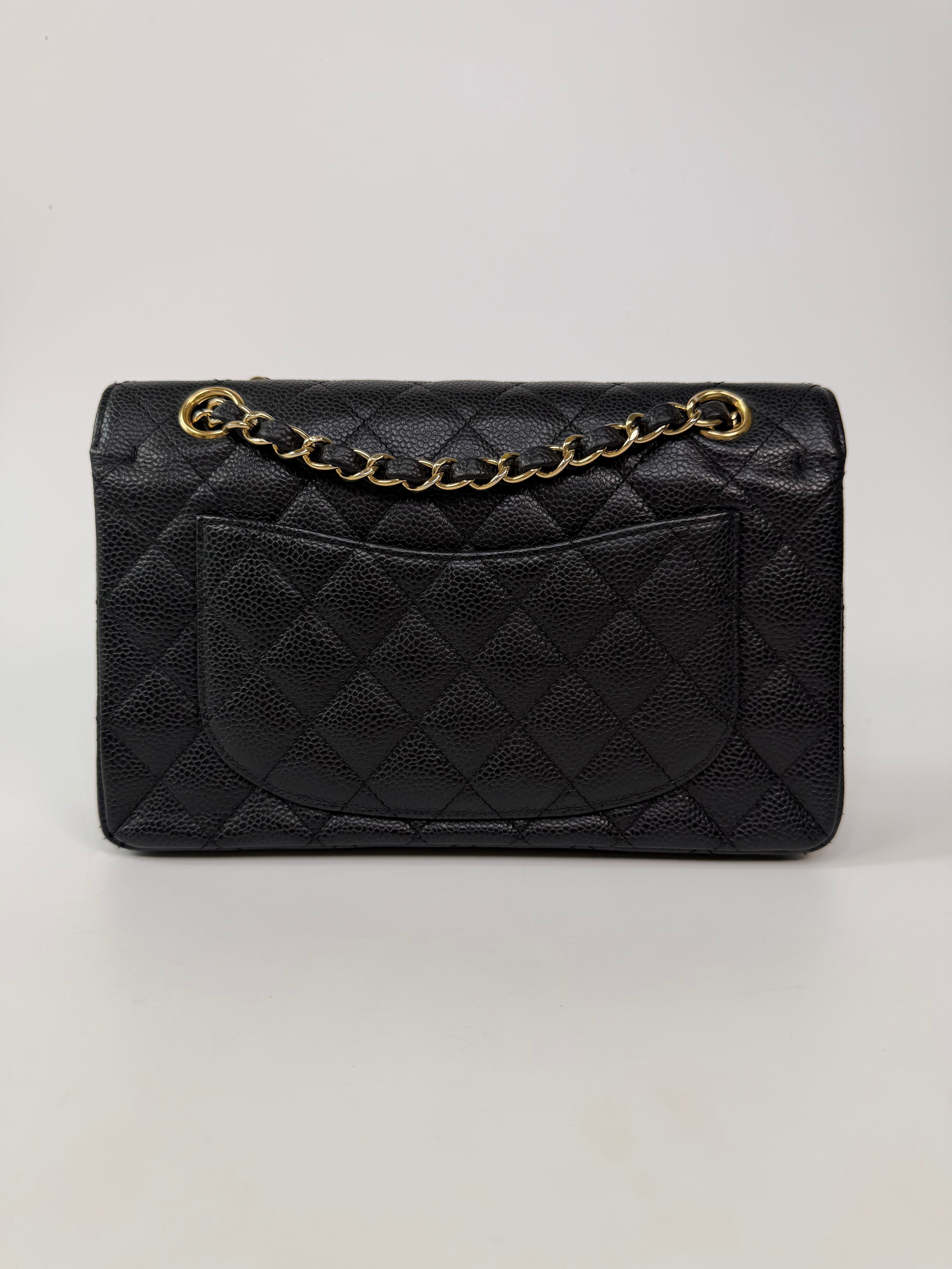 Chanel Small Classic Double Flap In Black Caviar Leather With Gold Hardware. 100% authentic and preloved in excellent condition