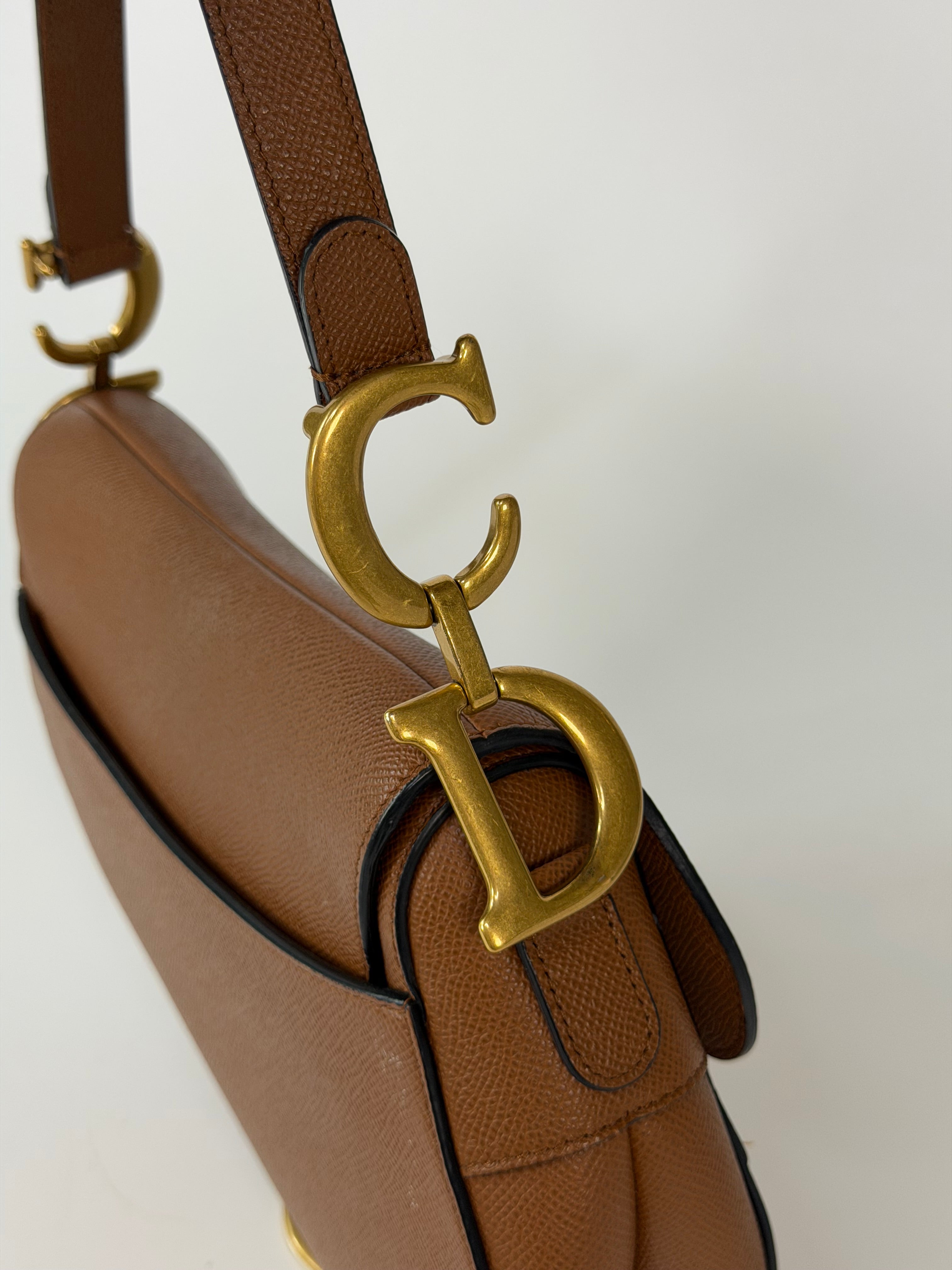 Christian Dior Saddle Bag In Golden Calfskin Gold Hardware. 100% authentic and preloved in excellent condition.