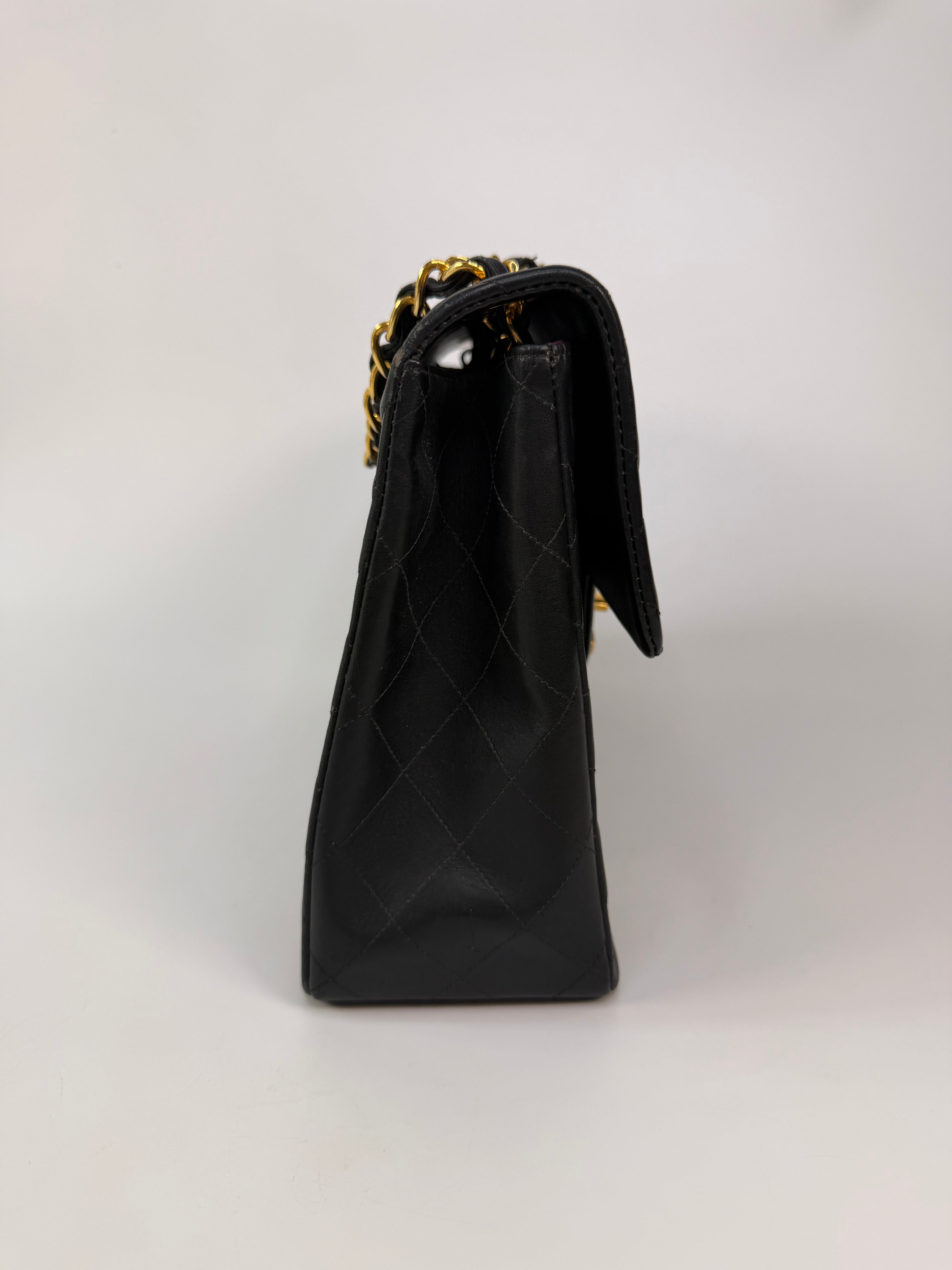 Chanel Vintage XL Maxi Flap Bag In Black Lambskin Gold Hardware. 100% authentic and preloved in excellent condition