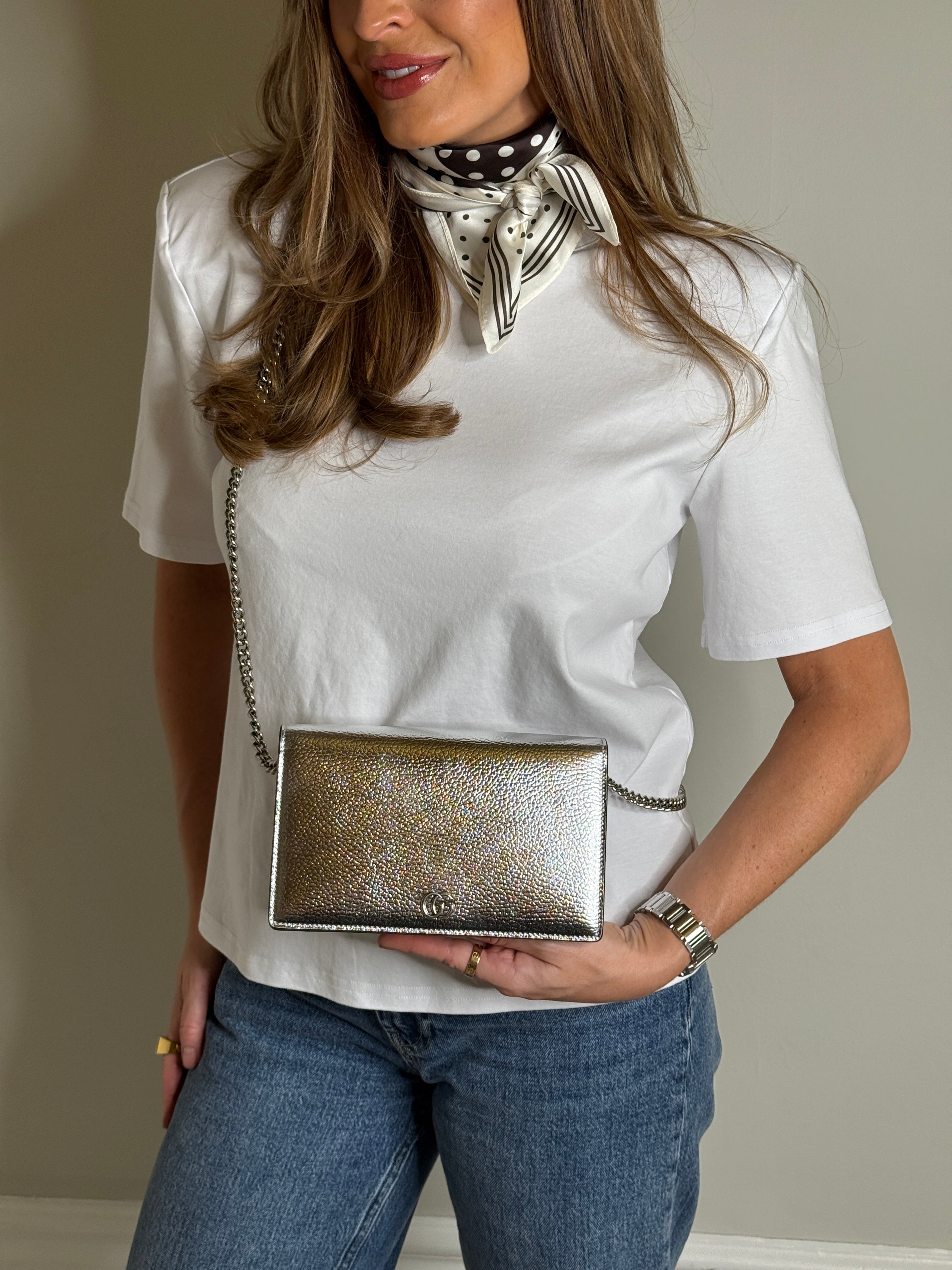 Authentic and preloved Gucci GG Marmont Leather Wallet On Chain In Metallic Silver Leather. Excellent Condition. 100% Authenticity guarantee. 