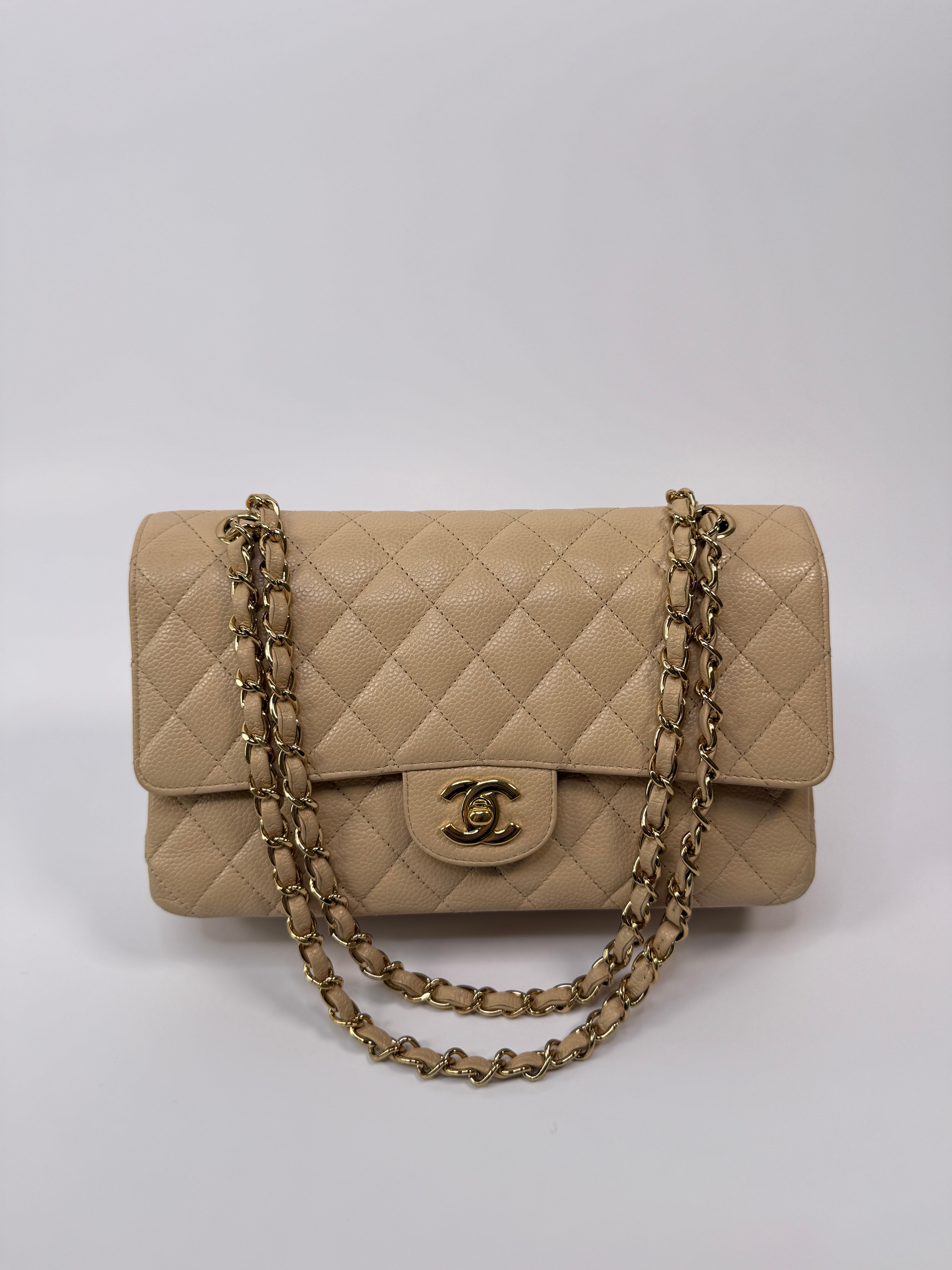 Chanel Medium Classic Double Flap Beige Caviar Leather With Gold Hardware
Pre Loved & Authentic 