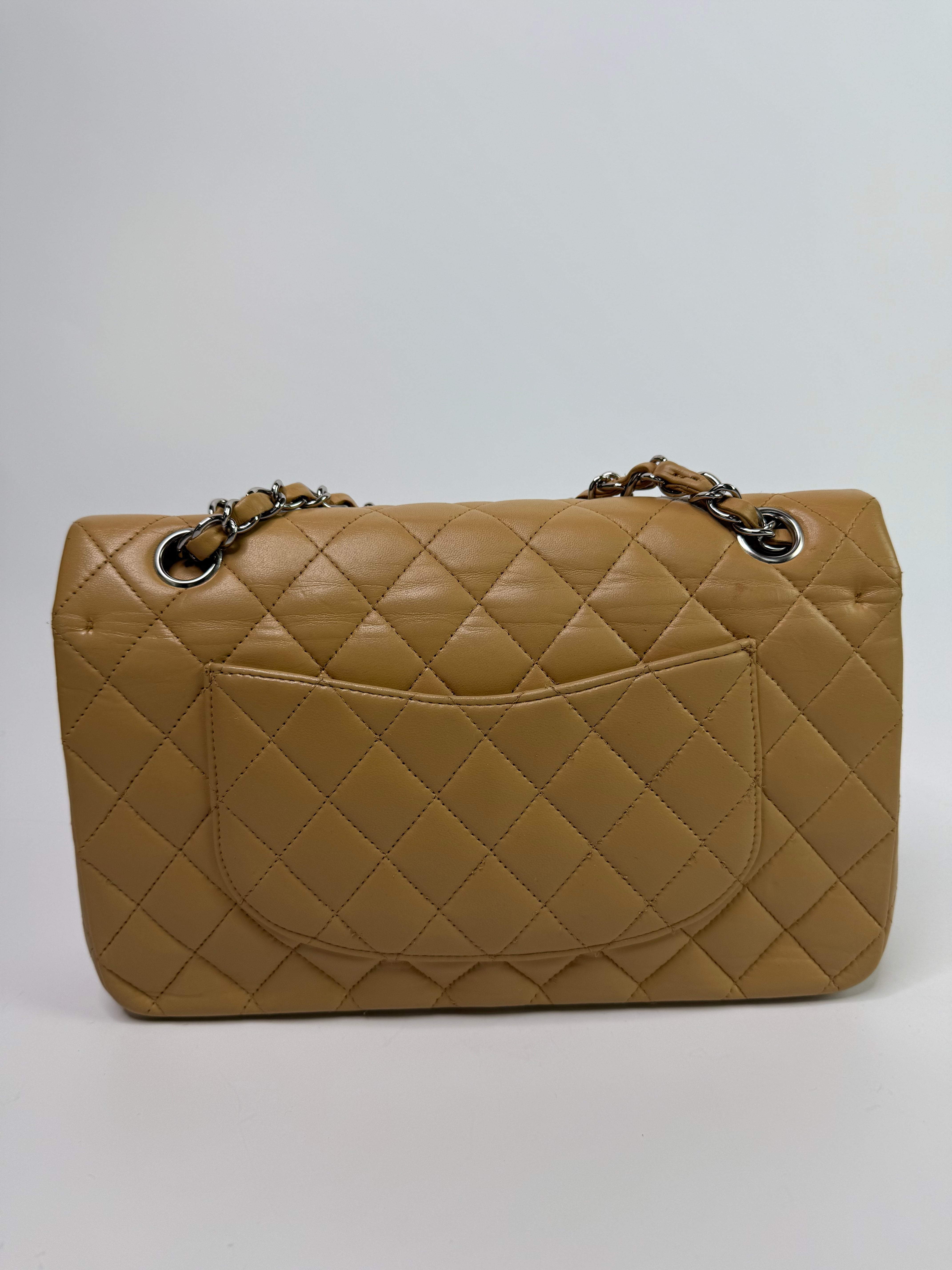 Chanel Medium Classic Double Flap Beige Lambskin With Silver Hardware
Pre Loved & Authentic 