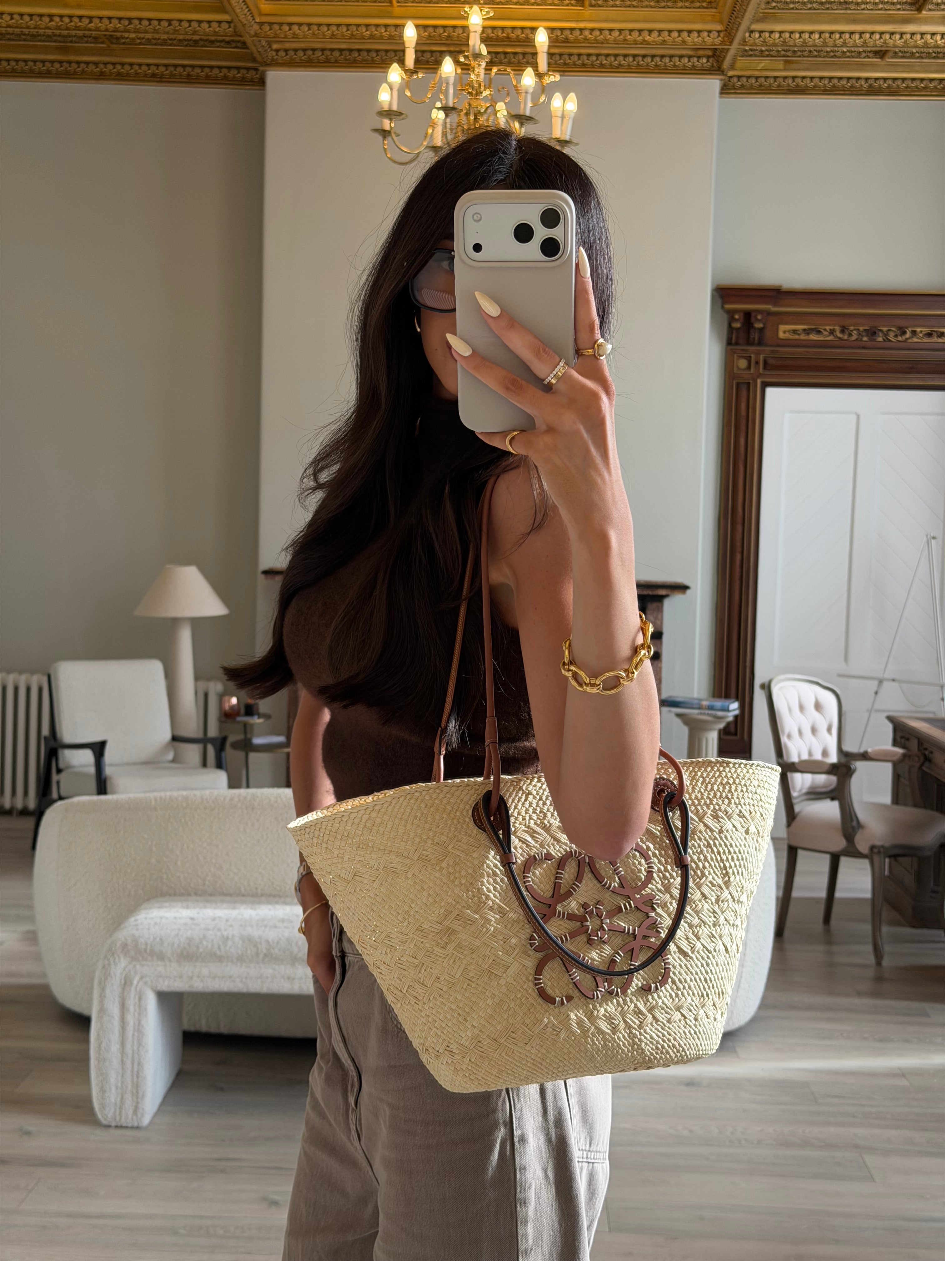 Authentic and preloved Loewe Paula's Ibiza Anagram Basket Bag In Excellent Condition. 100% Authenticity guarantee
