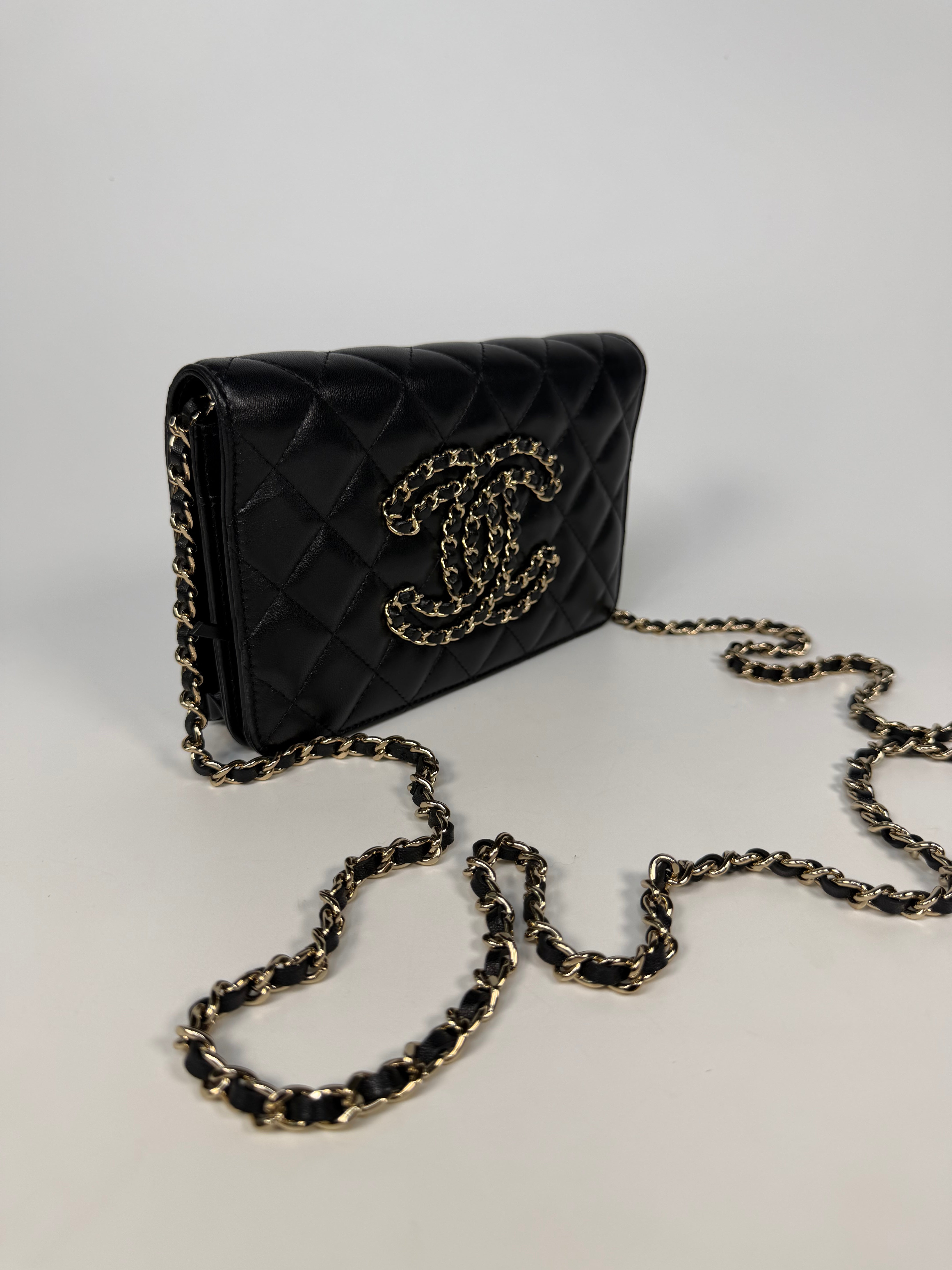 Chanel  Wallet On Chain Black lambskin Leather Gold hardware
Very Good condition, Authentic, Pre Loved. Verified by Luxe Cheshire. International, fast and fully insured delivery. Trusted designer resale.