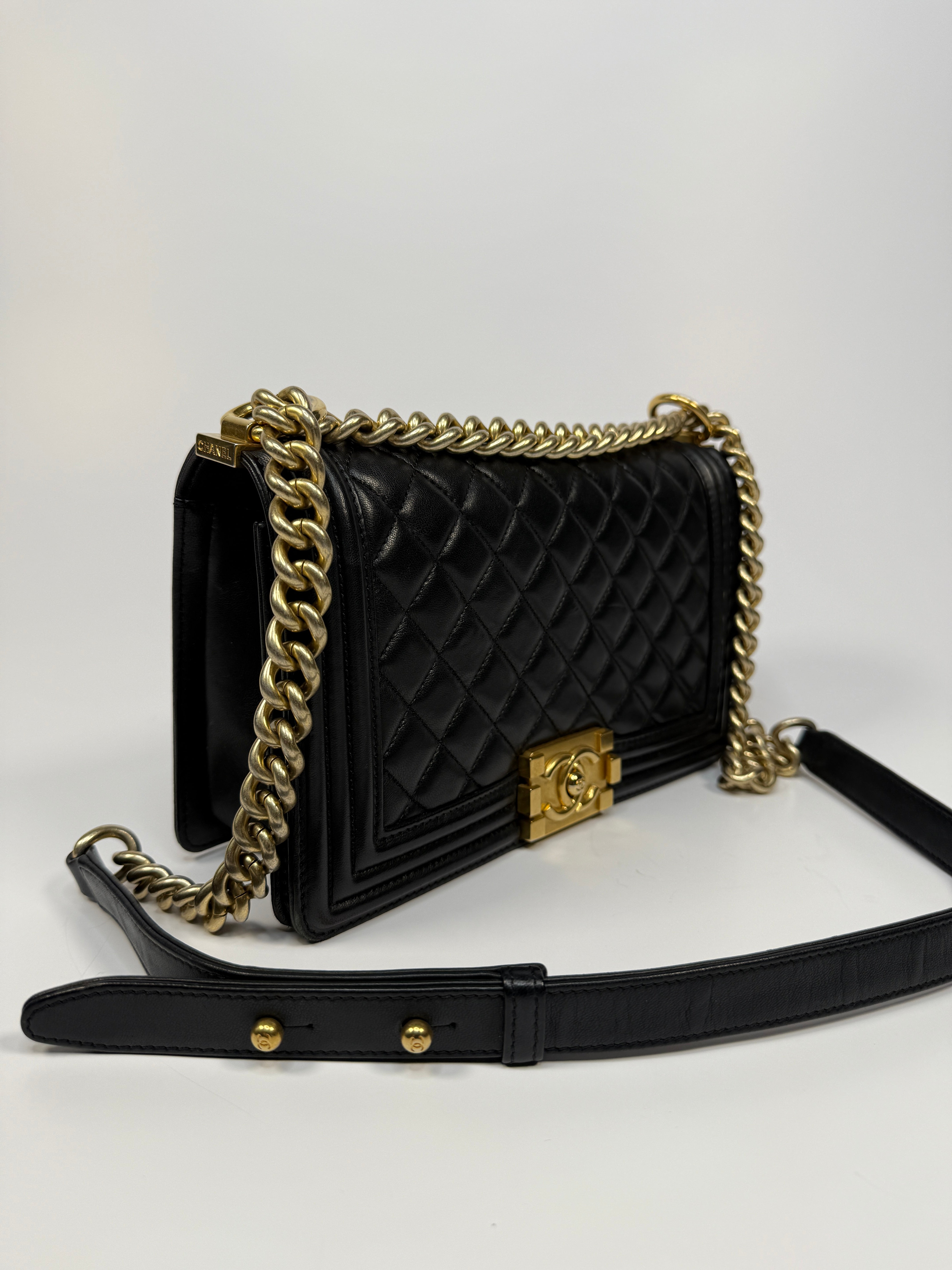 Chanel Boy Bag Medium In Black Lambskin Leather With Gold Hardware 
Pre Loved & Authentic 