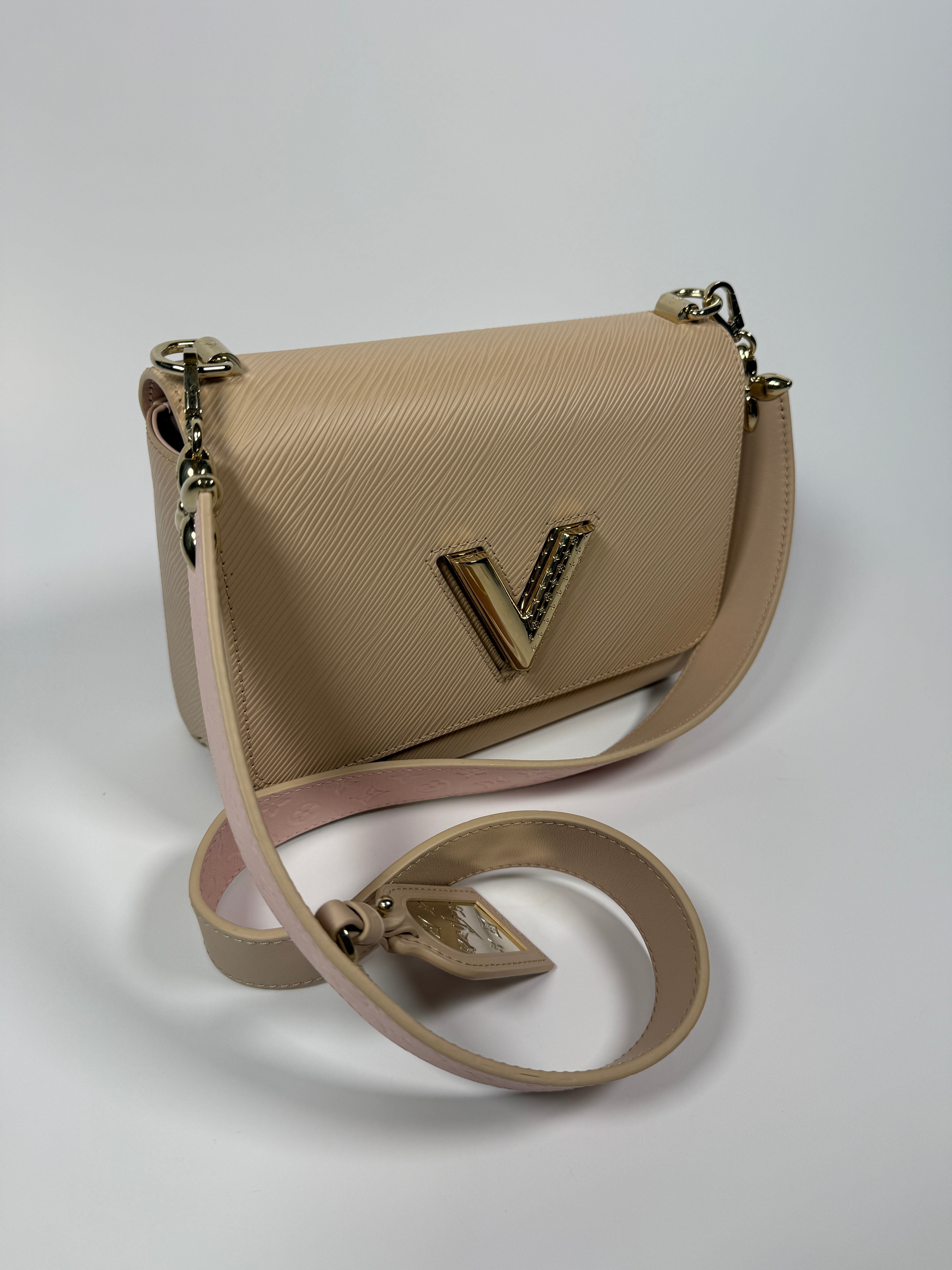 Louis Vuitton Twist MM Bag In Blush Pink Epi Leather 