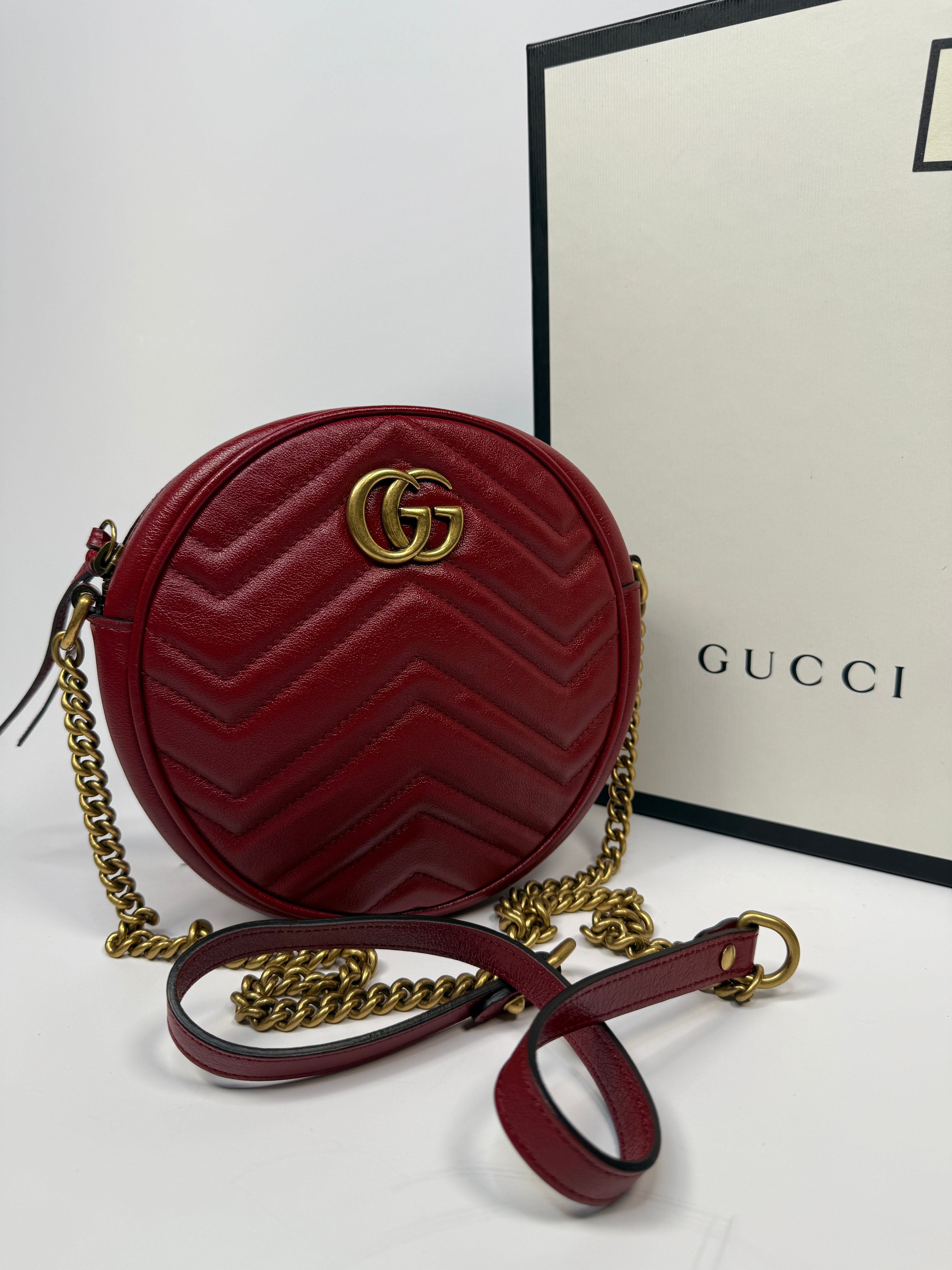 Gucci GG Marmont Round Shoulder Bag In Red Leather, very good condition. Authentic and preloved. 100% Authenticity guarantee