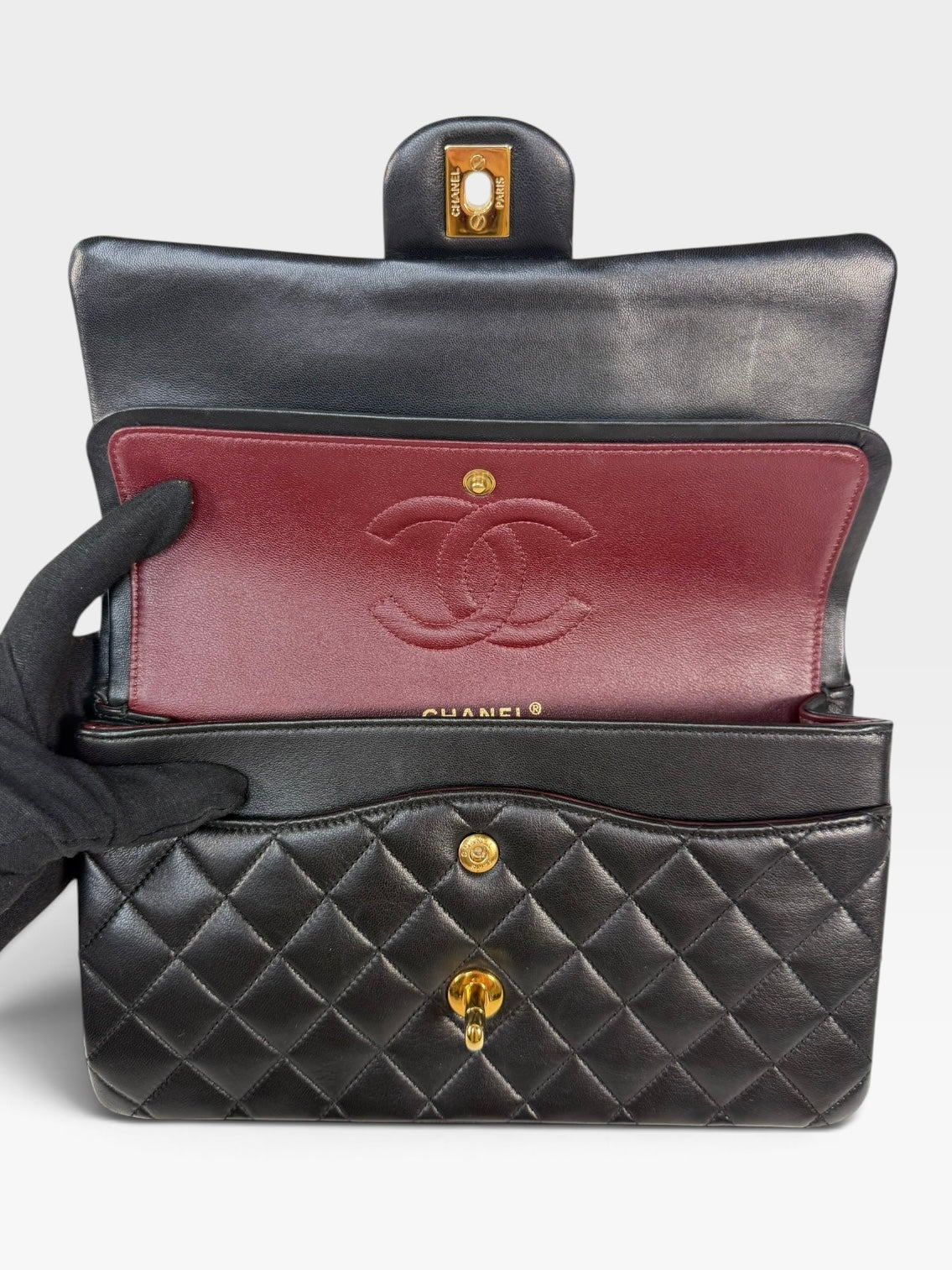 Chanel Medium Classic Double Flap In Black Lambskin Leather With Gold Hardware. 100% authentic and preloved in excellent condition