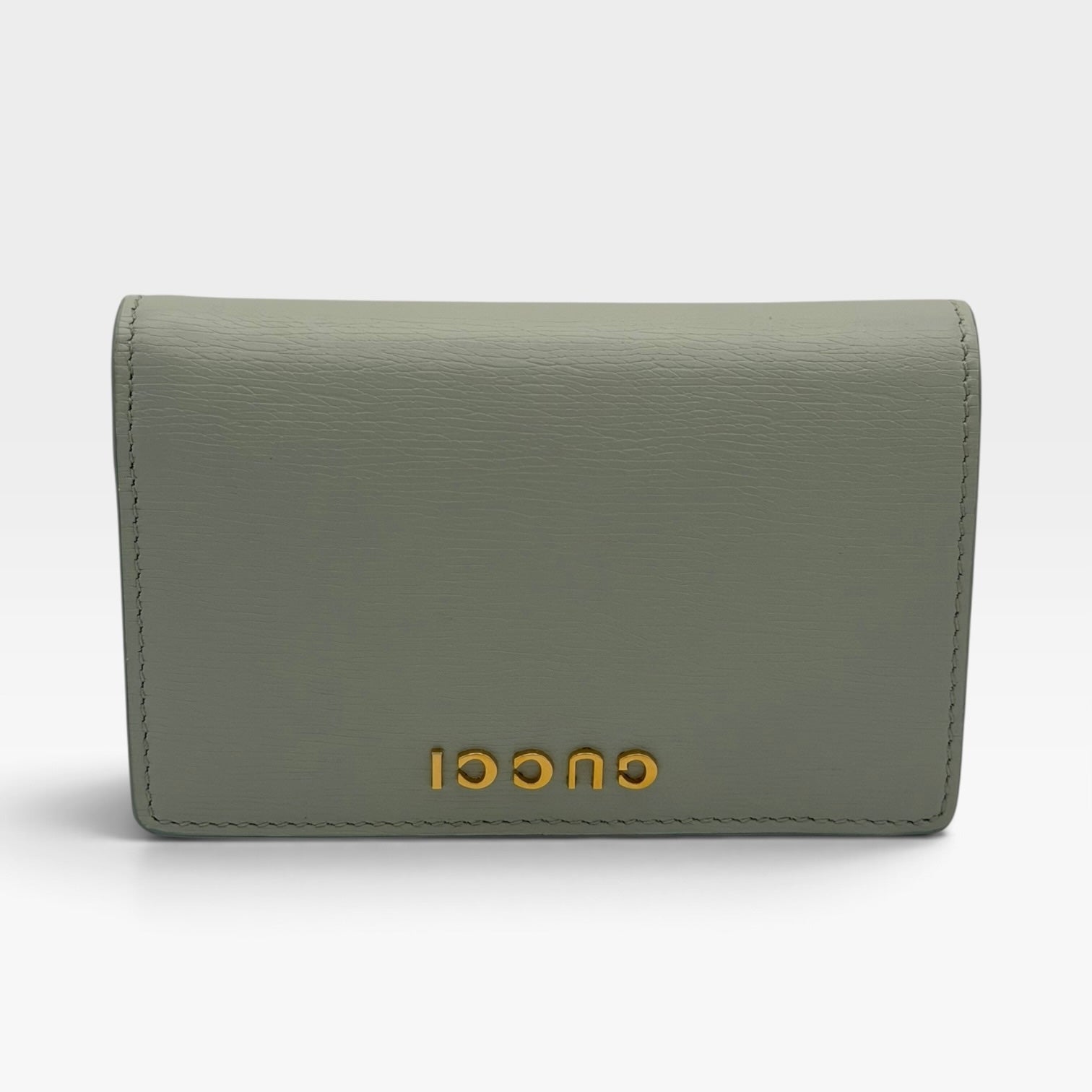 Gucci GG Embossed Wallet In Grey Leather With Gold Hardware. Authentic and preloved in excellent condition. Insured next day delivery. Verified by Luxe Cheshire.